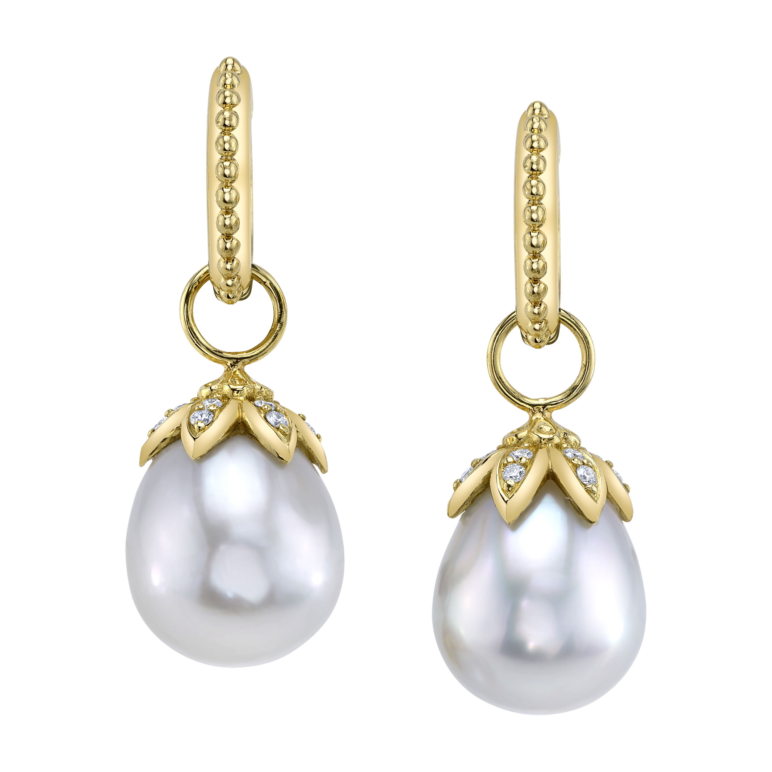 These earrings feature South Sea white pearls set in 18k yellow gold, accented by sparkling round diamonds. The combination of luminous pearls and brilliant diamonds creates a timeless and elegant pair, perfect for elevating any look. Huggies sold separately. -18k Yellow gold-South sea and white pearls-Round diamonds, 0.24ctsItem# 809-00690 Leigh Charm Earrings