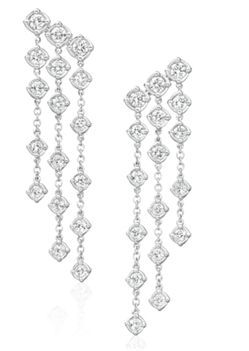 Make a statement with these stunning waterfall earrings, featuring cascading diamonds set in a twisted faux bezel. The unique setting adds depth and dimension, while the flowing design creates graceful movement with every step. Sophisticated and eye-catching, they’re perfect for special occasions or elevating your evening look.-18k Two toned gold-Round diamonds, 2.51ctsItem# 150-01758 Two Toned Chandelier Earrings