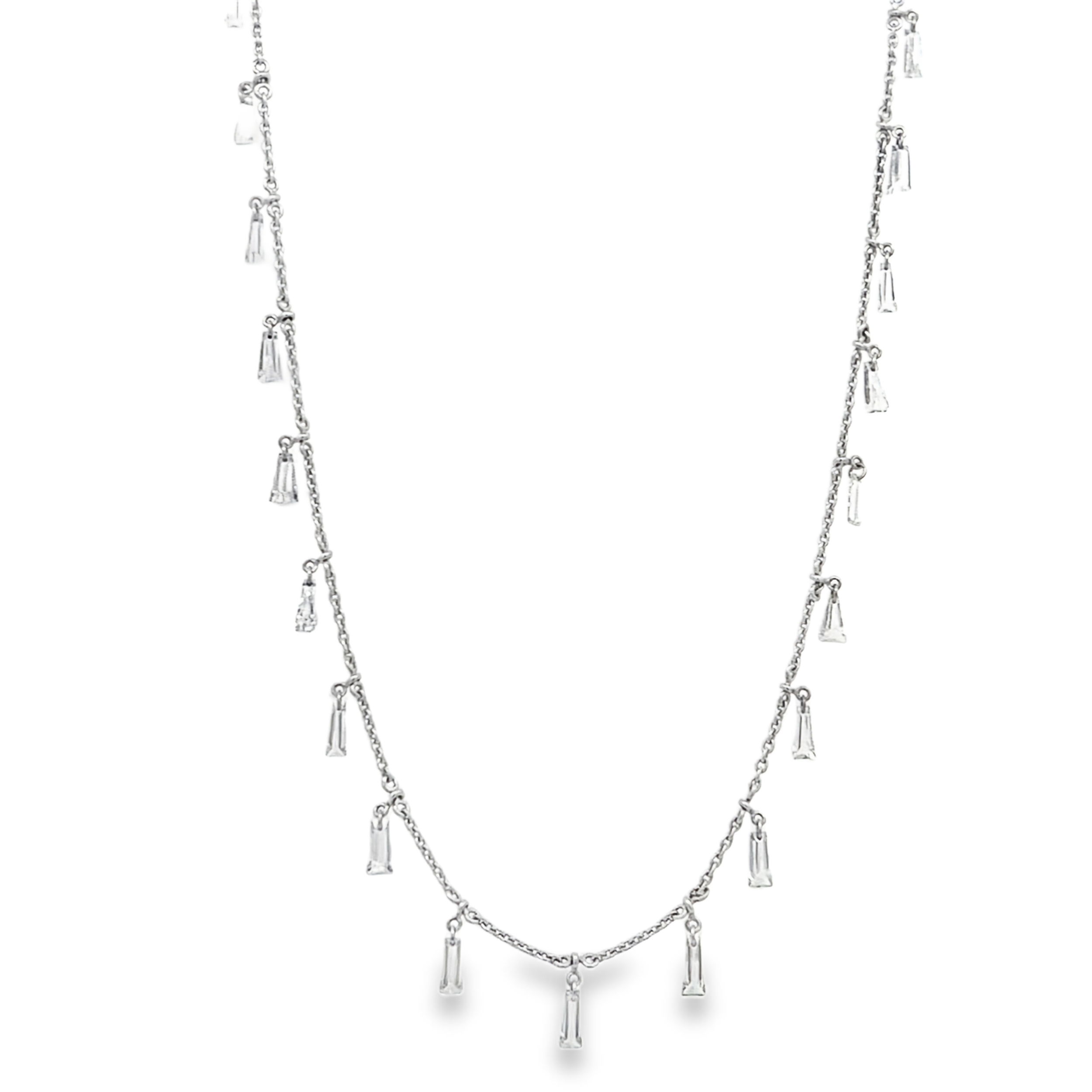 Exquisitely combining the beauty of natural diamonds and modern unique design, Fancy Creations showcases their signature laser cut diamonds and exceptional creativity within every piece, each more fascinating than the last.-18k White gold-Trapezoid diamonds, 2.25ctsItem# 165-2000019 Trapezoid Drop Necklace