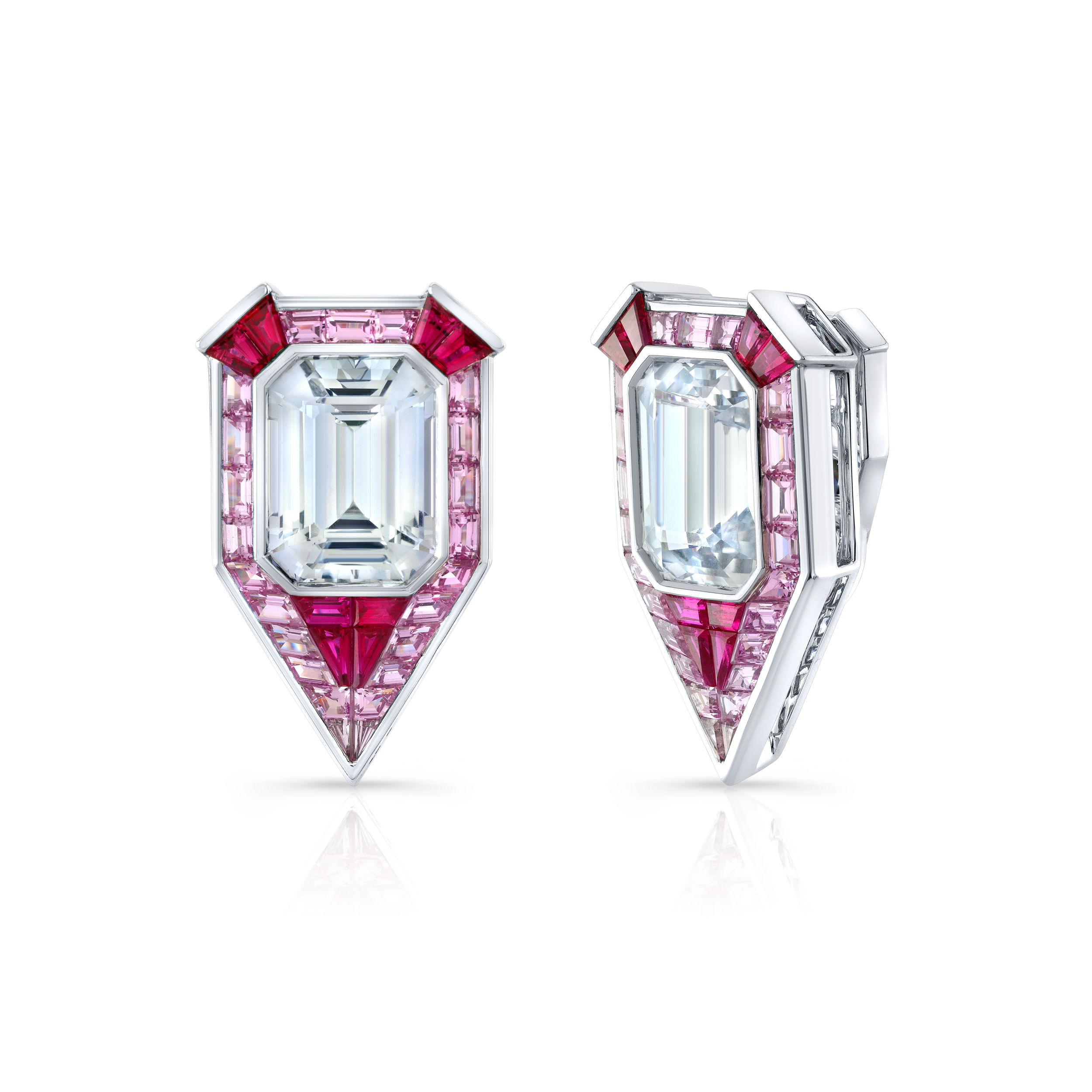 These platinum earrings showcase a striking combination of emerald-cut sapphires, pink sapphires, and rubies. Bold and colorful, they make an unforgettable statement with their rich hues and refined design.-Platinum-Emerald cut sapphires, 15.73cts-Pink sapphire baguettes, 4.91cts-Ruby baguettes, 1.84ctItem# 002-210-2000007 Masterpiece Earrings