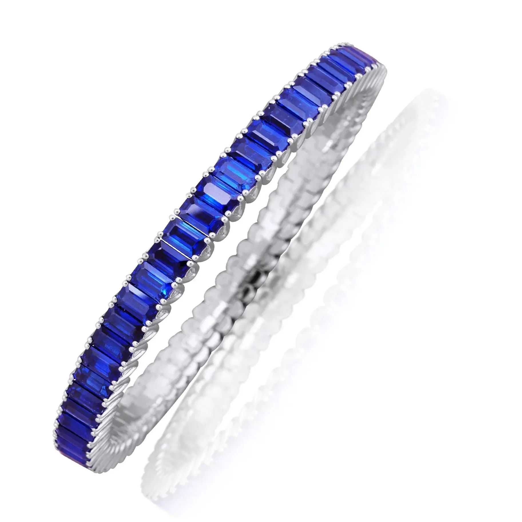 The Xpandable Collection is a revolutionary new line of rings and bracelets that features an innovative technology that solves the problems of tailoring and comfort.-18k white gold-Emerald Cut Blue Sapphires, "Origin Kanchanaburi," 36.20cts-Expandable Size, Contact for sizing optionsItem# 240-00323 Xpandable Blue Sapphire Bracelet