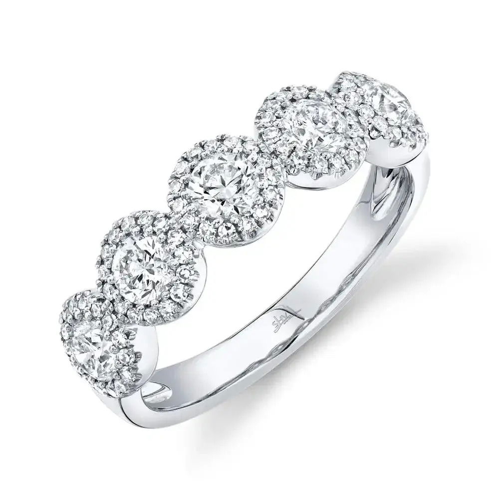 Classy and timeless, this piece offers fashion-forward elegance that will enhance your collection for years to come. All Shy Creation diamonds are natural and hand-selected. All stones are unique and hand set. As a result, you can expect slight variations in the shade, hue, tint of the color stones and stone count.-14k White gold-Round diamonds, 1.25cts-Size 7Item# 804-00837 Round Diamond Band