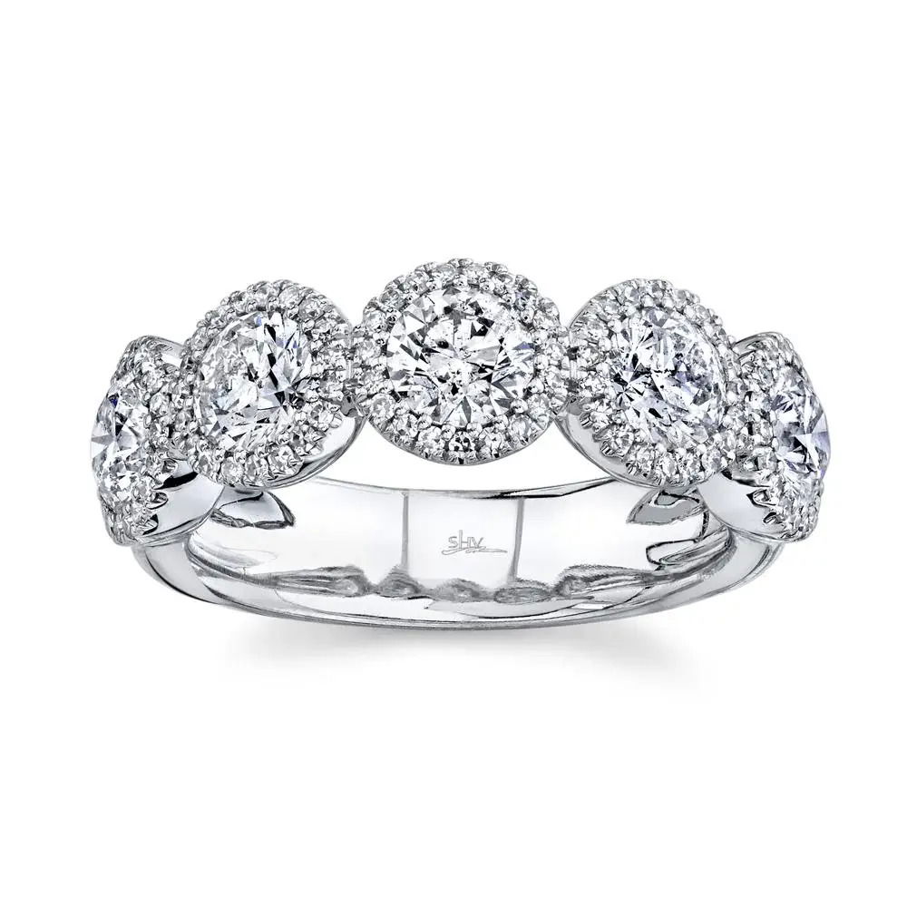 Classy and timeless, this piece offers fashion-forward elegance that will enhance your collection for years to come. All Shy Creation diamonds are natural and hand-selected. All stones are unique and hand set. As a result, you can expect slight variations in the shade, hue, tint of the color stones and stone count.-14k White gold-Round diamonds, 2.00cts-Round diamonds, 0.28cts-Size 7 Item# 804-2000003 Side Diamond Band