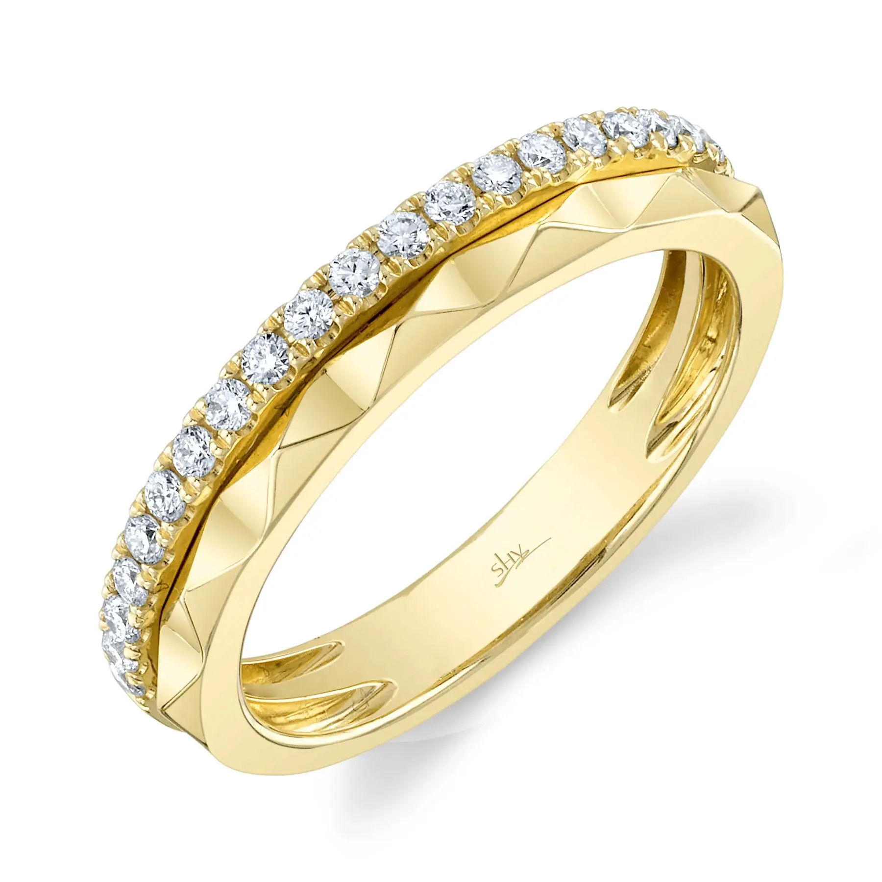 Petite yet bold, wear this piece stacked or on its own to elevate any style with a touch of sophistication. All Shy Creation diamonds are natural and hand-selected. All stones are unique and hand set. As a result, you can expect slight variations in the shade, hue, tint of the color stones and stone count.-14k Yellow gold-Round diamonds, 0.26cts-Size 7Item# 804-2000005 Diamond Band