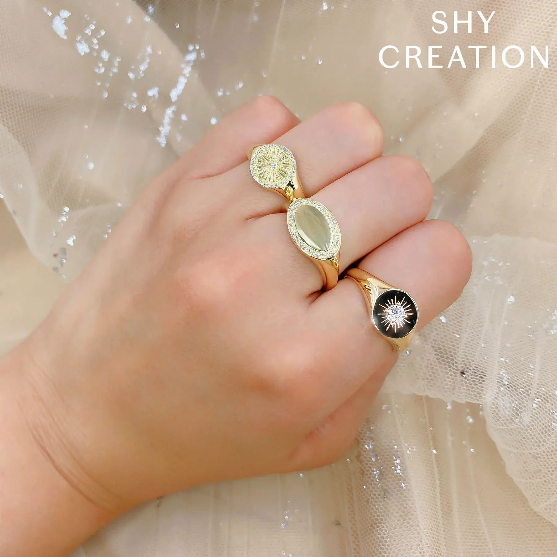 Charming yet practical, this piece offers all-day style and comfort, perfect for any occasion. All Shy Creation diamonds are natural and hand-selected. All stones are unique and hand set. As a result, you can expect slight variations in the shade, hue, tint of the color stones and stone count.-14k Yellow gold-Round diamonds, 0.08cts-Dimensions, 0.40"W-Size 7Item# 804-2000008 Diamond Signet Ring