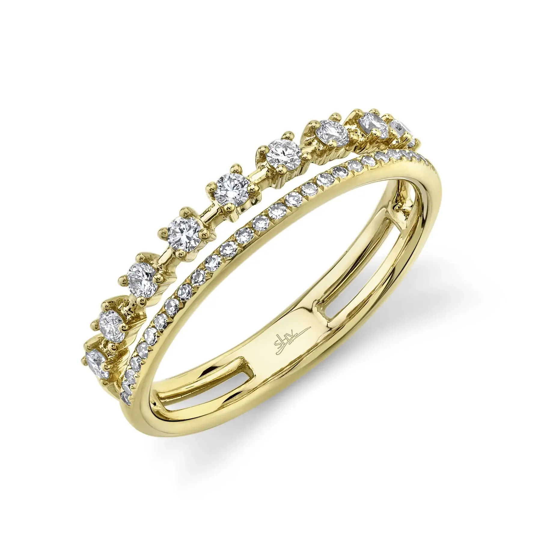 Subtle yet sophisticated, this piece enhances both casual and formal looks with its refined sparkle. All Shy Creation diamonds are natural and hand-selected. All stones are unique and hand set. As a result, you can expect slight variations in the shade, hue, tint of the color stones and stone count.-14k Yellow gold-Round diamonds, 0.24cts-Round diamonds, 0.08cts-Dimensions, 0.15"W-Size 7Item# 804-2000009 Line and Station Diamond Ring
