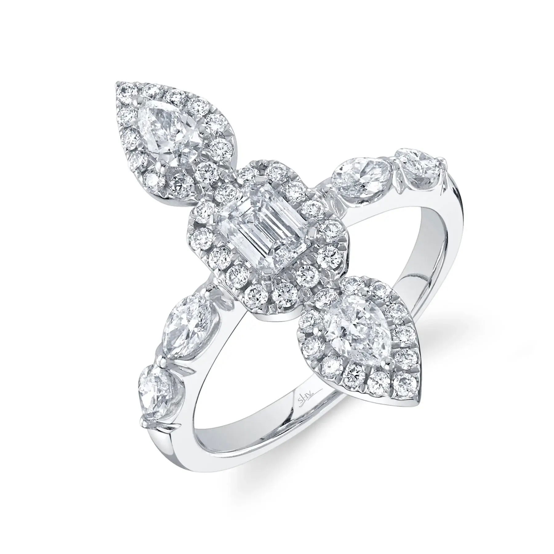 Make a lasting impression with this head-turning design, crafted for those who appreciate bold style. All Shy Creation diamonds are natural and hand-selected. All stones are unique and hand set. As a result, you can expect slight variations in the shade, hue, tint of the color stones and stone count.-14k White gold-Emerald diamonds, 0.43cts-Pear diamonds, 0.32cts-Round diamonds, 0.32cts-Marquise diamonds, 0.39cts-Size 7.5Item# 804-2000042 Diamond Emerald Marquise Pear Ring