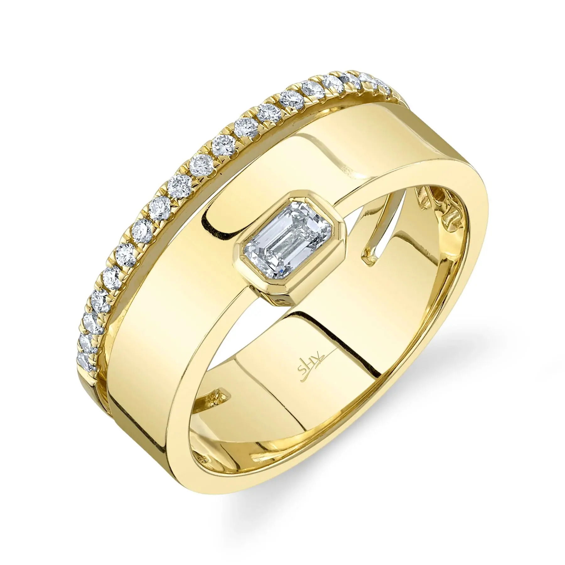 Turn heads with this standout piece that adds a bold statement to any look, day or night. All Shy Creation diamonds are natural and hand-selected. All stones are unique and hand set. As a result, you can expect slight variations in the shade, hue, tint of the color stones and stone count.-14k Yellow gold-Round diamonds, 0.15cts-Emerald diamond, 0.24ct-Size 7Item# 804-2000083 Diamond Emerald Band