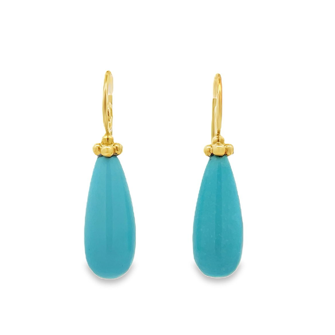These turquoise drop earrings in 18k yellow gold add a bright pop of color. Perfect for both everyday wear and special occasions.-18k Yellow gold-Turquoise DropsItem# 002-805-01429 Turquoise Drop Earrings