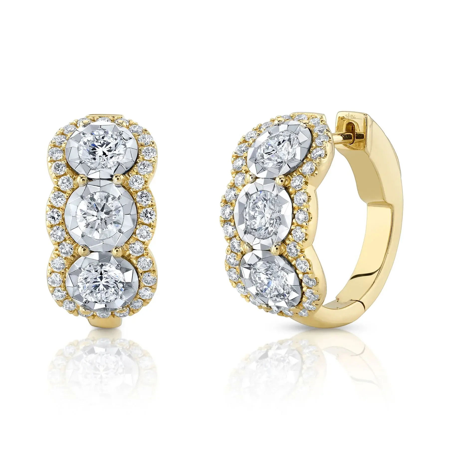A true showstopper, these earrings are designed to stand out and make a statement wherever you go. All Shy Creation diamonds are natural and hand-selected. All stones are unique and hand set. As a result, you can expect slight variations in the shade, hue, tint of the color stones and stone count.-14k Yellow gold-Round diamonds, 1.20cts-Round diamonds, 0.58cts-Dimensions, 0.70" diameterItem# 805-01672 Diamond Hoop Earrings