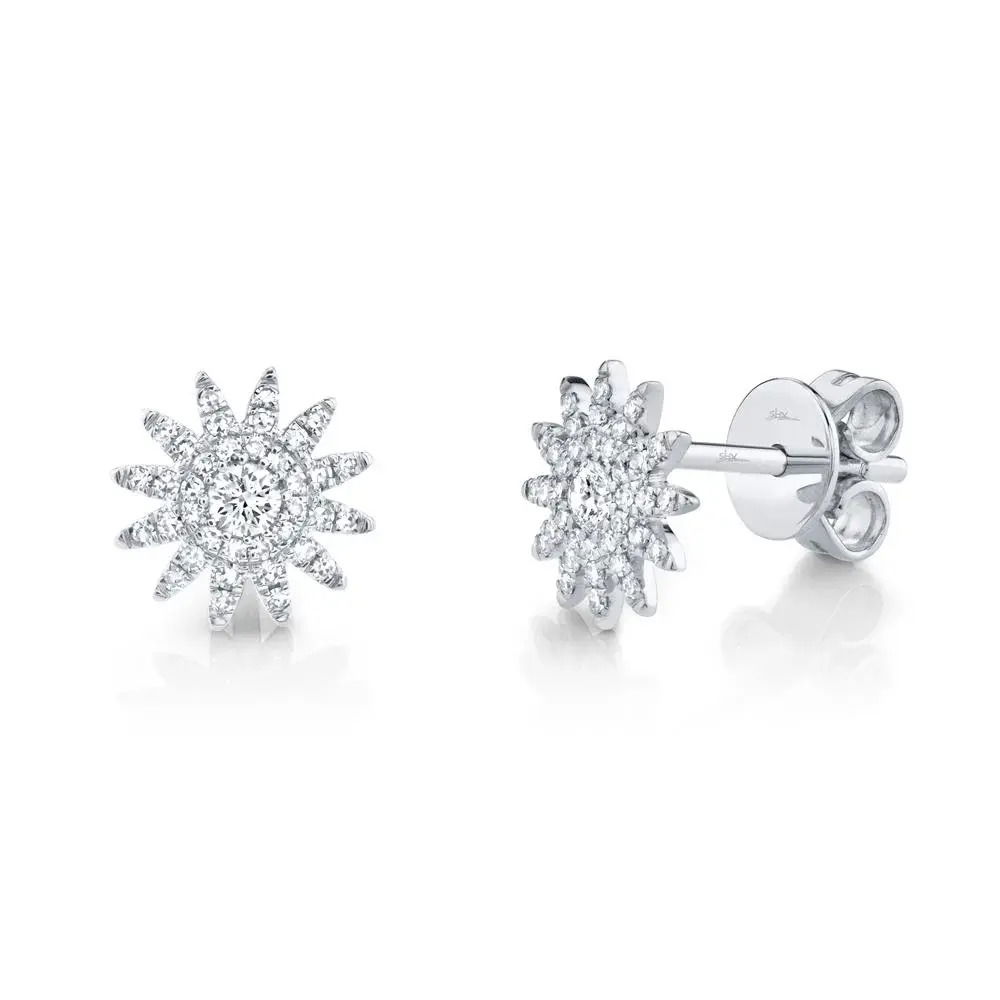 This striking statement piece commands attention with its unique design, ensuring you’ll stand out. All Shy Creation diamonds are natural and hand-selected. All stones are unique and hand set. As a result, you can expect slight variations in the shade, hue, tint of the color stones and stone count.-14k White gold-Round diamonds, 0.24cts-Dimensions, 0.60"L / 0.30"WItem# 805-01736 Diamond Starburst Studs