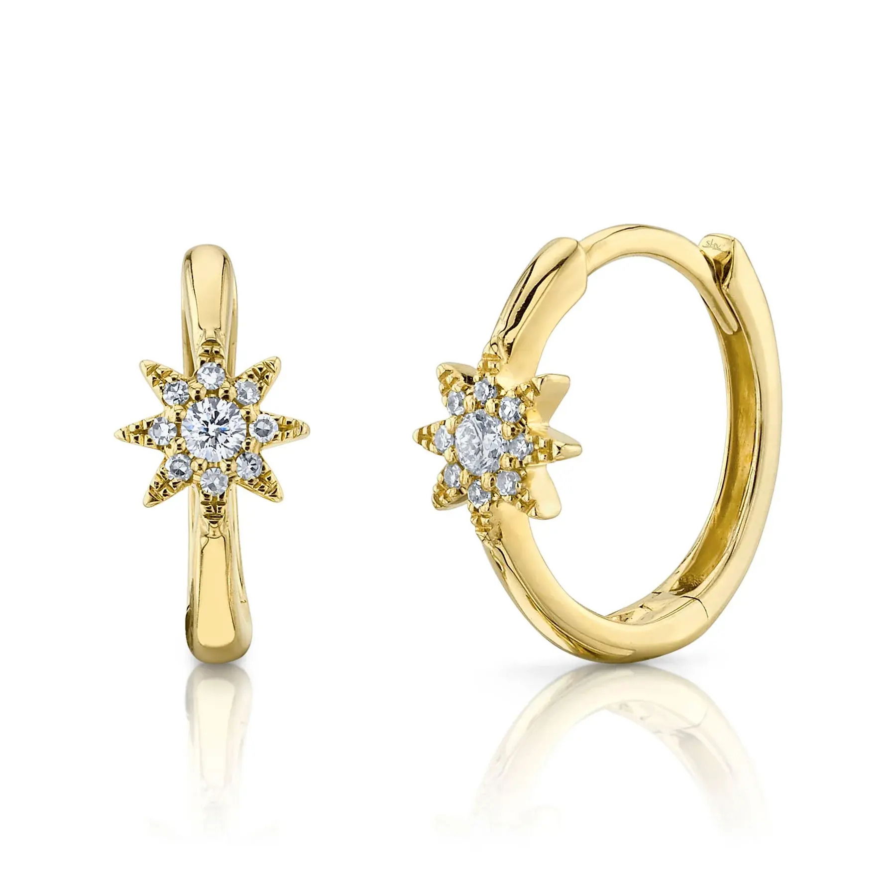 Enjoy a piece that combines standout style with all-day comfort, making it perfect for any occasion. All Shy Creation diamonds are natural and hand-selected. All stones are unique and hand set. As a result, you can expect slight variations in the shade, hue, tint of the color stones and stone count.-14k Yellow gold-Round diamonds, 0.05cts -Round diamonds, 0.05cts -Dimensions, 0.50"L / 0.20"WItem# 805-01742 Diamond Starburst Huggie Earrings