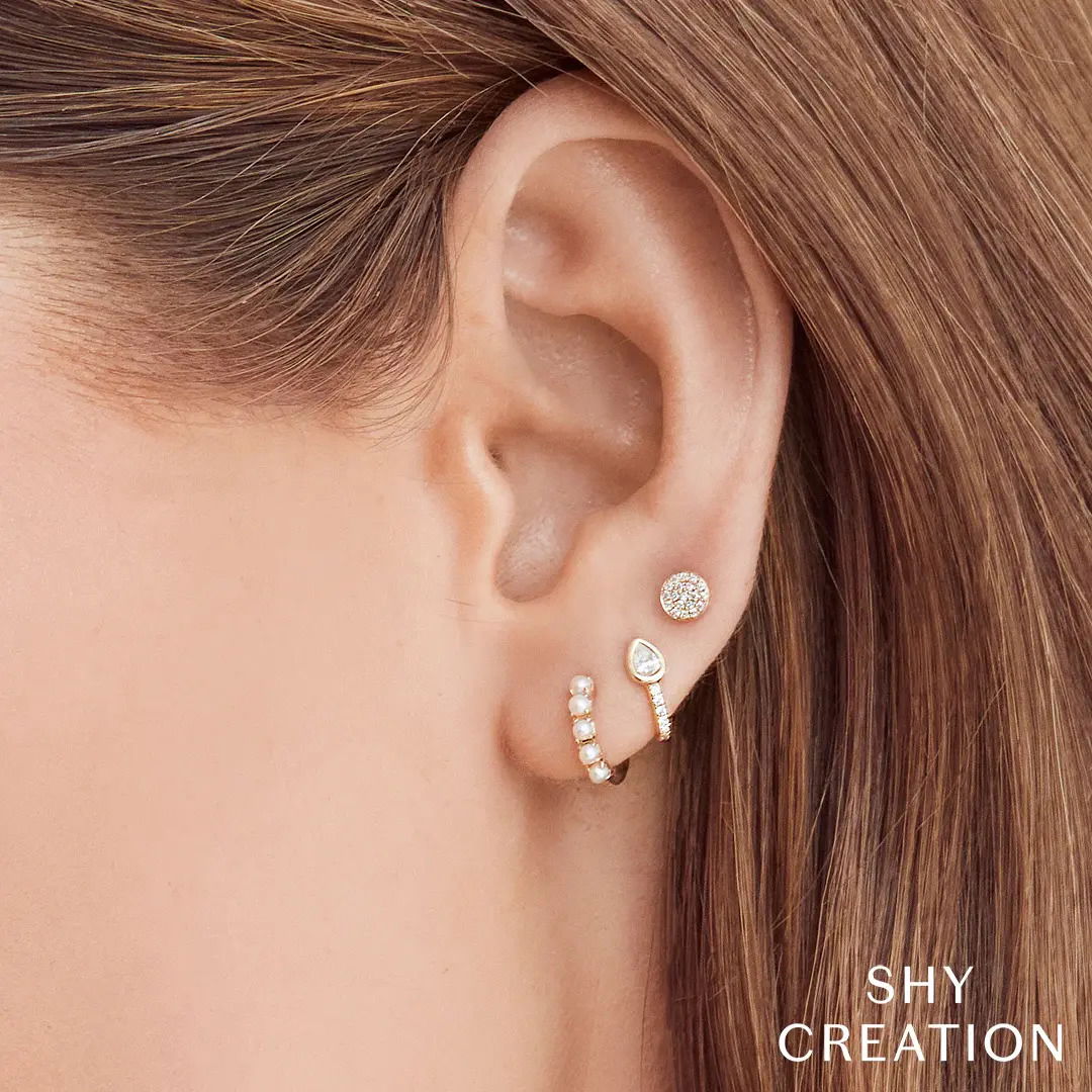This versatile piece easily transitions from day to night, making it perfect for any occasion. All Shy Creation diamonds are natural and hand-selected. All stones are unique and hand set. As a result, you can expect slight variations in the shade, hue, tint of the color stones and stone count.-14k White gold-Round diamonds, 0.07cts-Dimensions, 0.20"L / 0.20"WItem# 805-2000043 Diamond Pave Circle Stud Earrings