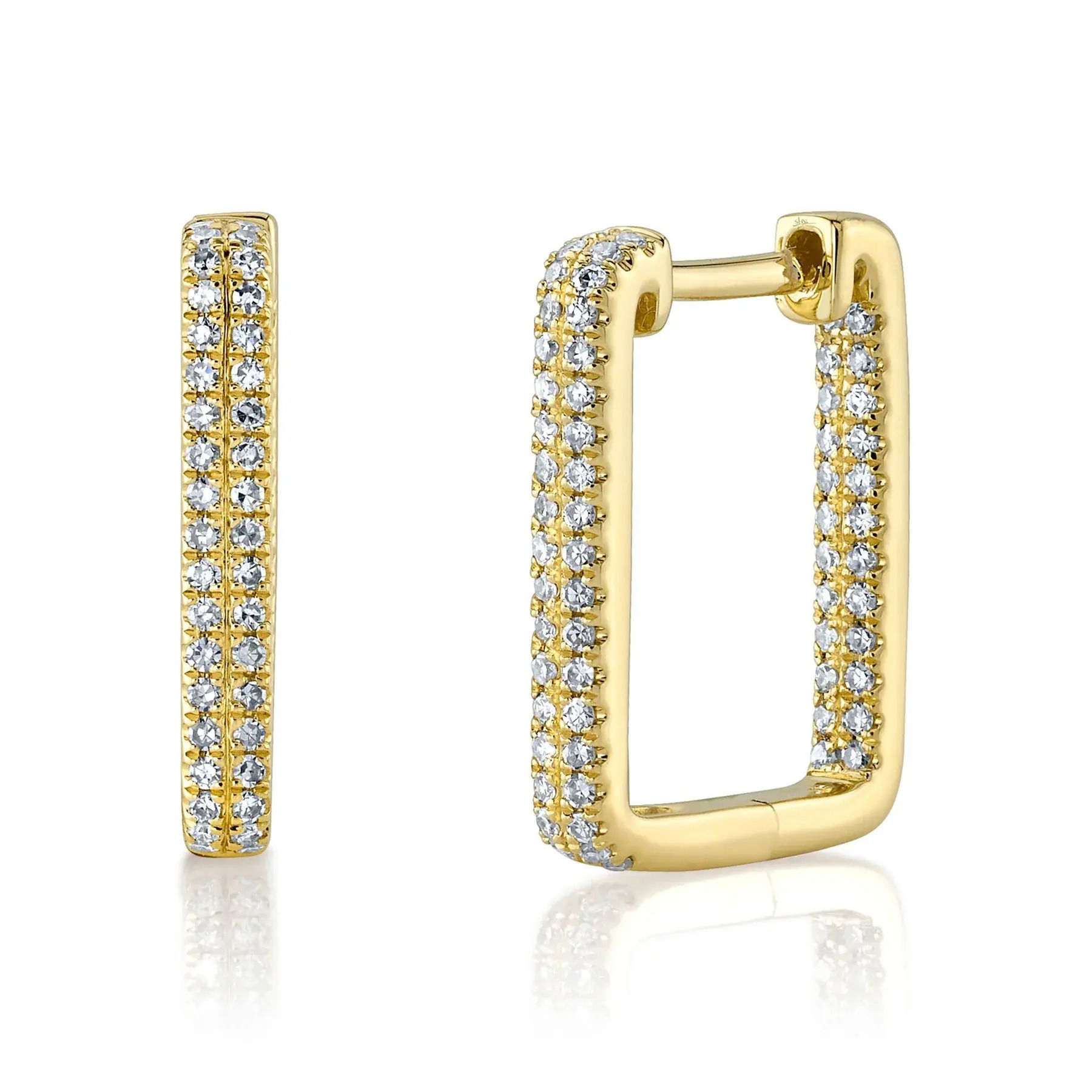A timeless piece that elevates both casual and formal outfits, perfect for any occasion. Shy Creation diamonds are natural and hand-selected. All stones are unique and hand set. As a result, you can expect slight variations in the shade, hue, tint of the color stones and stone count.-14k Yellow gold-Round diamonds, 0.27cts-Dimensions, 0.60x0.45" diameterItem# 805-2000124 Diamond Rectangle Hoop Earrings