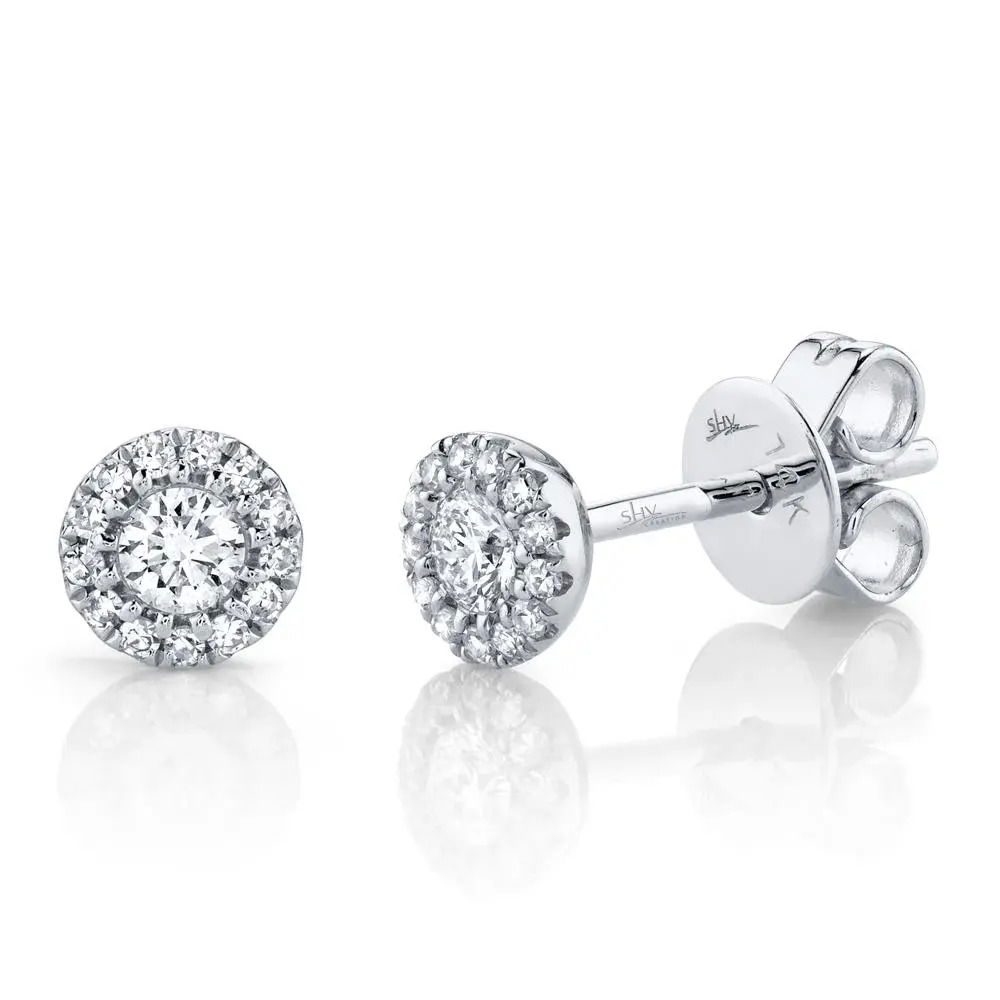 This timeless stud is the perfect finishing touch to any ensemble. All Shy Creation diamonds are natural and hand-selected. All stones are unique and hand set. As a result, you can expect slight variations in the shade, hue, tint of the color stones and stone count.-14k White gold-Round diamonds, 0.24cts-Dimensions, 0.45"WItem# 805-2000203 Diamond Stud Earring