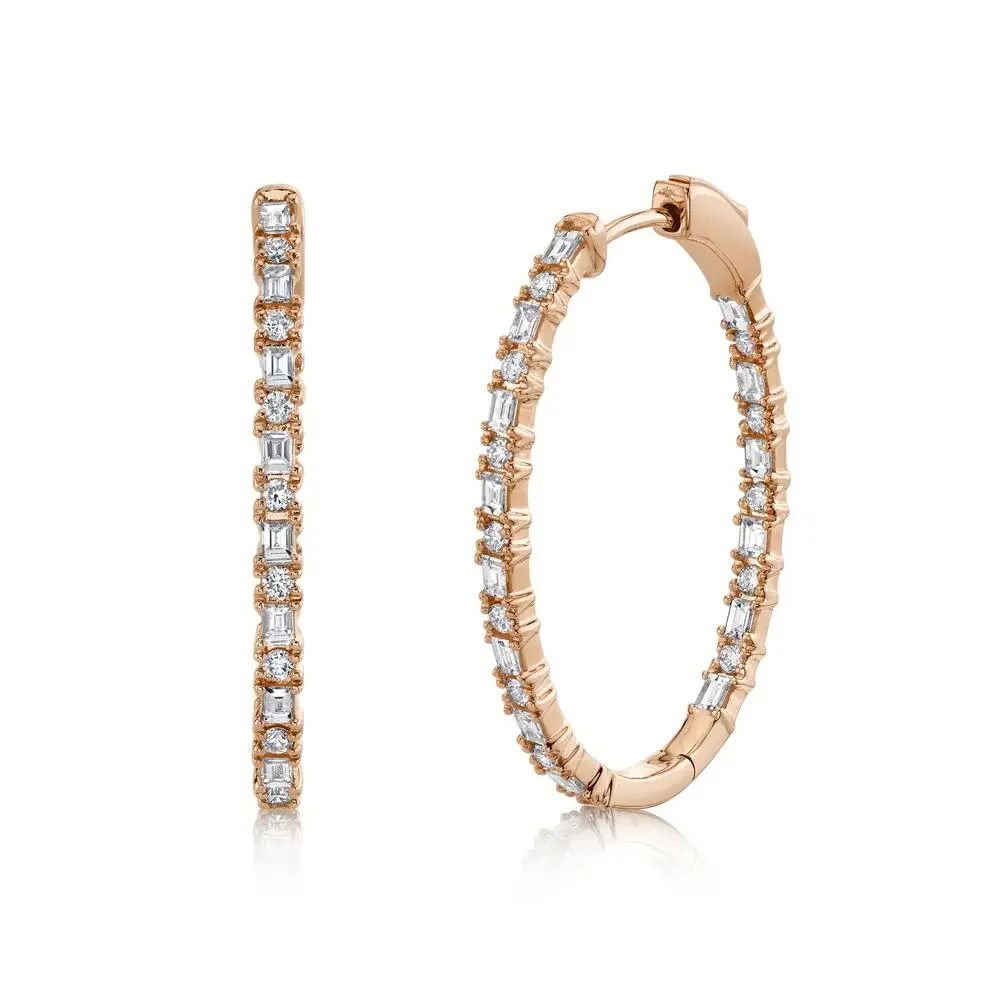 Command attention with the bold and striking design of this piece, perfect for making a lasting impression. All Shy Creation diamonds are natural and hand-selected. All stones are unique and hand set. As a result, you can expect slight variations in the shade, hue, tint of the color stones and stone count.-14k Rose gold-Baguette diamonds, 0.83cts-Oval diamonds, 0.43cts-Dimensions, 1.25" x 0.90" diameterItem# 805-2000218 Diamond Baguette Oval Hoop Earrings