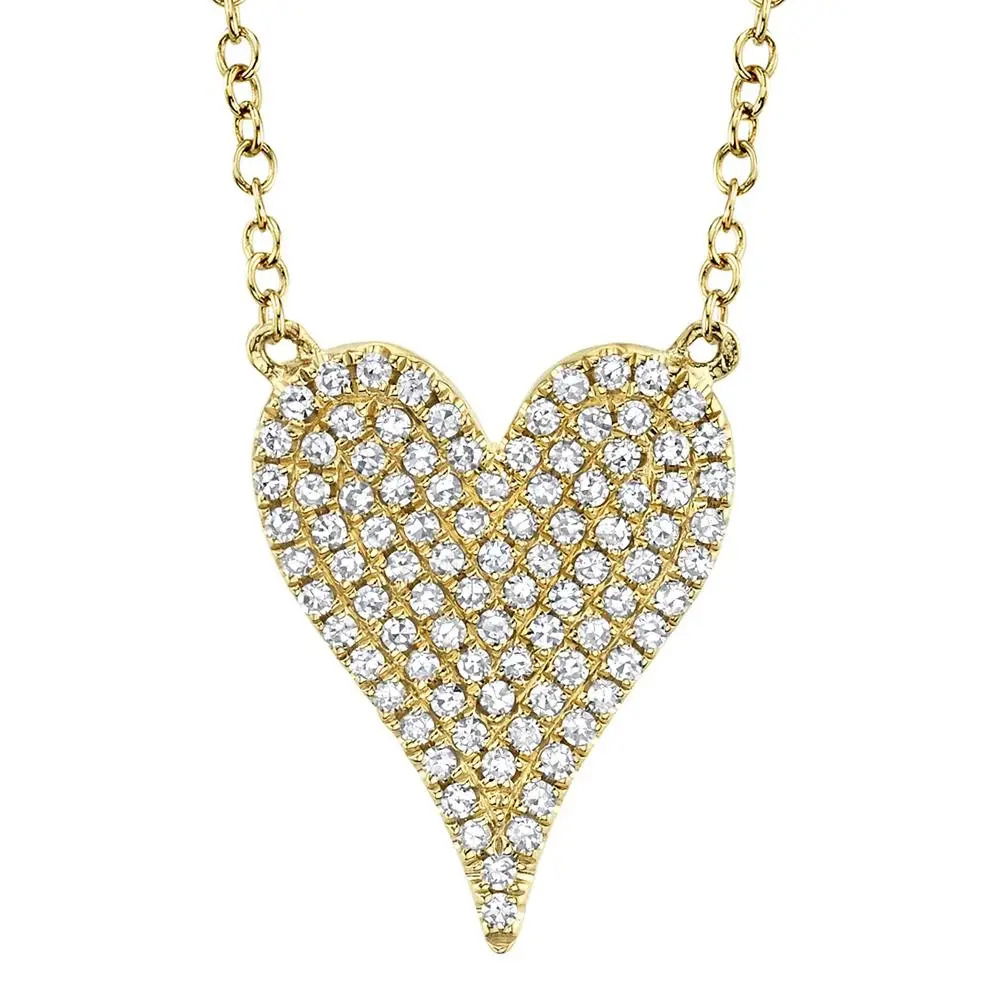 Crafted to stand out, this piece ensures you make the statement you deserve. All Shy Creation diamonds are natural and hand-selected. All stones are unique and hand set. As a result, you can expect slight variations in the shade, hue, tint of the color stones and stone count.-14k Yellow gold-Round diamonds, 0.21cts-Dimensions, 0.55"L / 0.40"W-Chain length, 15"-18"Item# 807-01098 Diamond Pave Heart Necklace