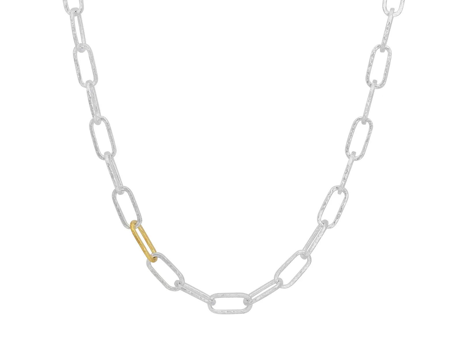 This short necklace features sterling silver oval links accented with 24k yellow gold for a modern, two-tone look. Its bold yet versatile design makes it perfect for everyday wear.-Sterling silver-24k Yellow gold-7.5mm Oval links-Length 18"Item# 002-807-01166 Paperclip Chain Necklace