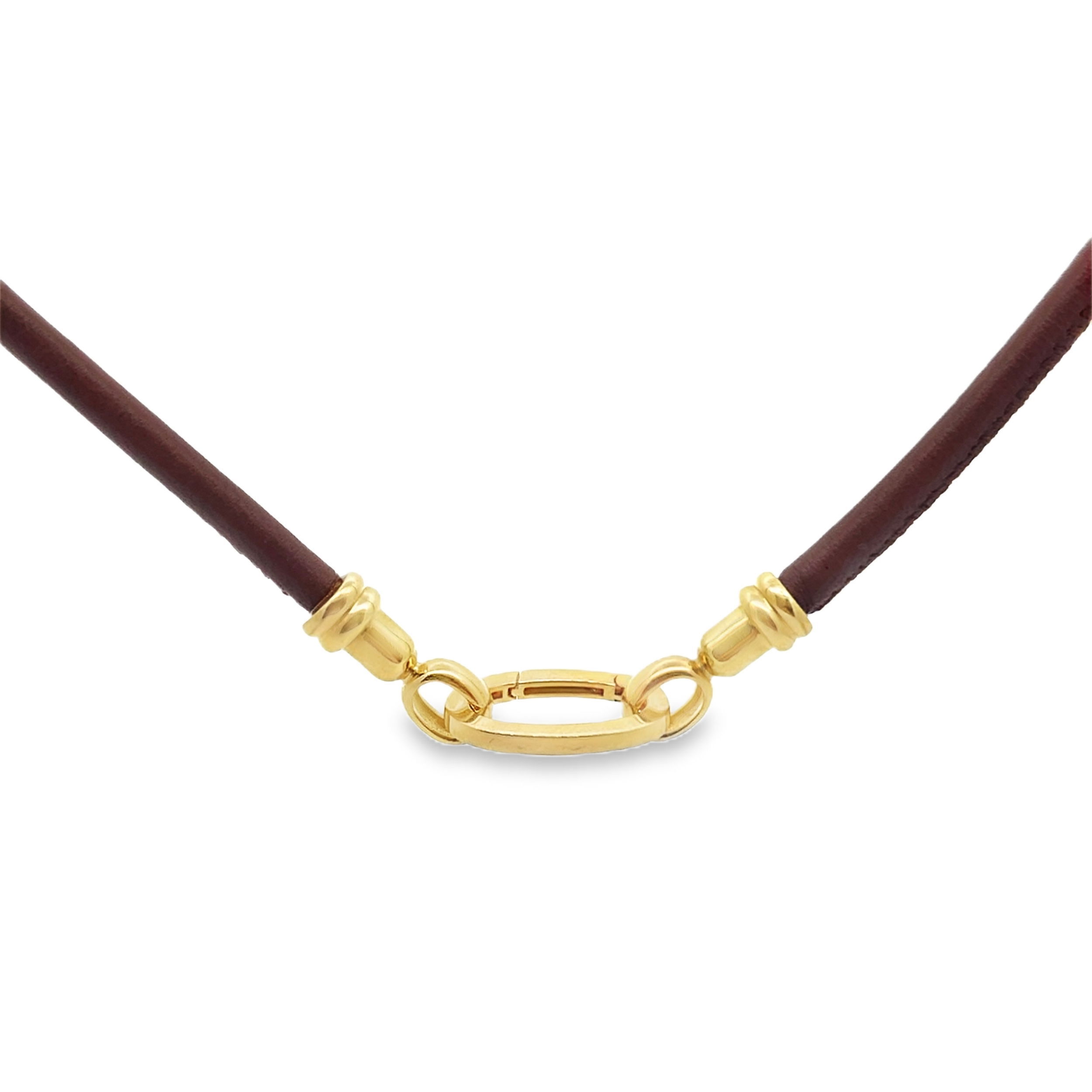 This necklace pairs 18k yellow gold with sleek leather for a bold, contemporary look. Add a pendant for versatility.-18k Yellow gold-Leather-Length 18”Item# 807-01176 Leather Necklace