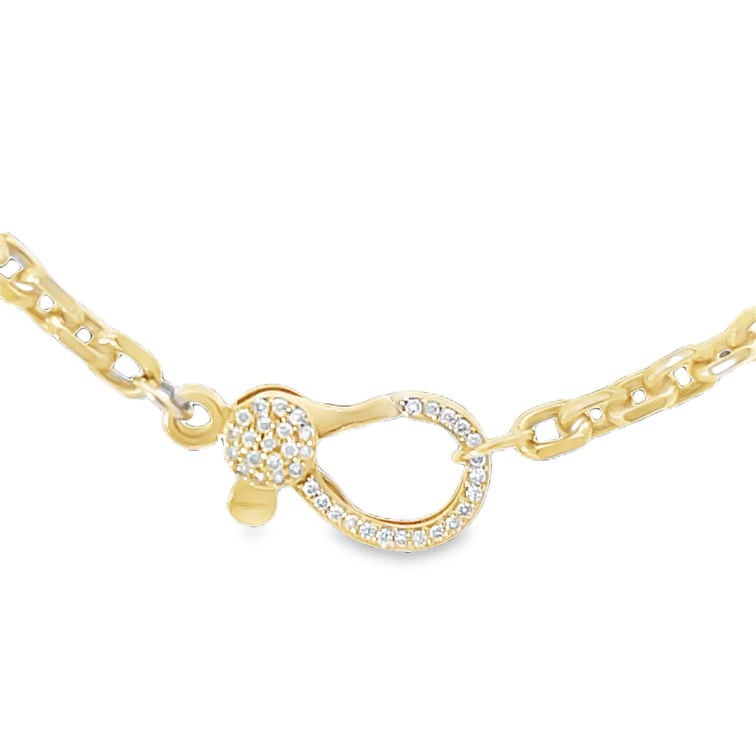 This elegant chain features a pave diamond-adorned clasp and closure, adding a touch of brilliance and sophistication to its sleek design. Perfect for wearing alone or pairing with your favorite pendants and charms, it offers both functionality and style.-14k Yellow gold-Round white diamonds, 0.23cts-Chain length, 16"Item# 807-2000090 Charm Chain Pave Closure