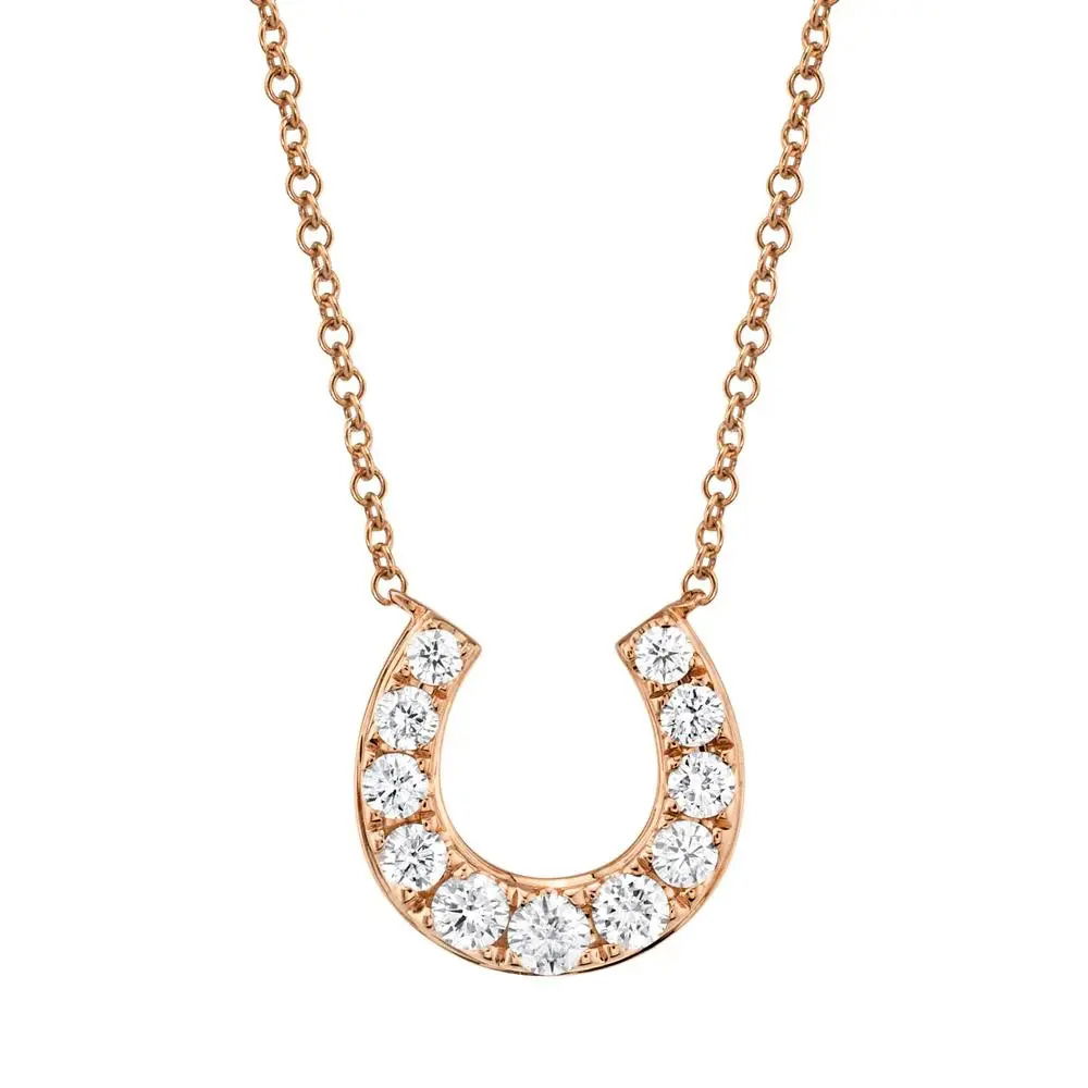 A beautiful accent piece or a stunning stand alone, this piece is the ideal addition to any collection. All Shy Creation diamonds are natural and hand-selected. All stones are unique and hand set. As a result, you can expect slight variations in the shade, hue, tint of the color stones and stone count.-14k Rose gold-Round diamonds, 0.36cts-Dimensions, 0.45"L / 0.45"W-Chain length, 15"-18"Item# 807-2000132 Diamond Horseshoe Necklace