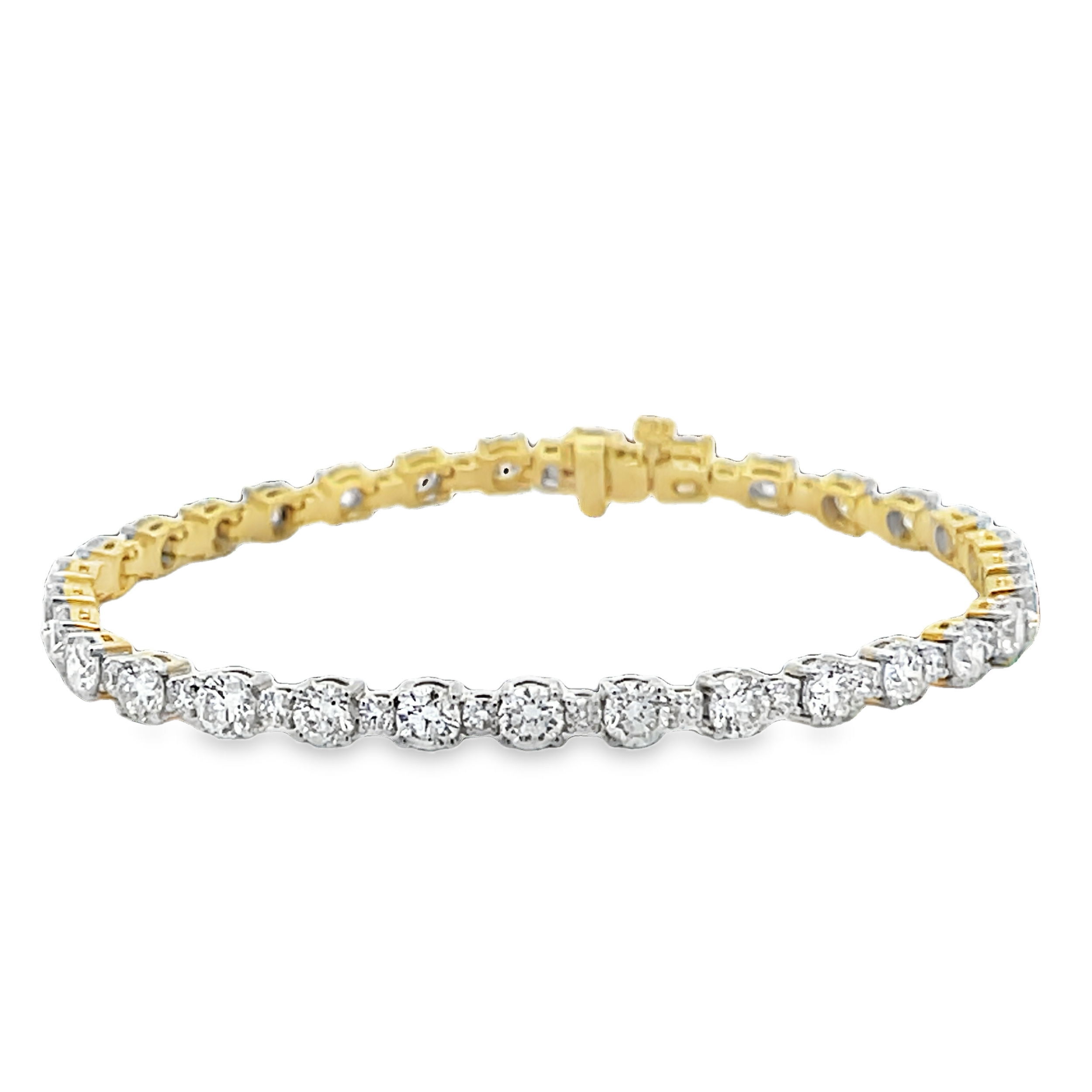 With a modern twist on a classic design, this bracelet is the perfect addition to any style, outfit, and jewelry collection, becoming a beautiful statement piece or a stunning standalone.-14k Yellow gold-Round diamonds, 7.10cts-Size, 7Item# 808-00905 Diamond Line Bracelet