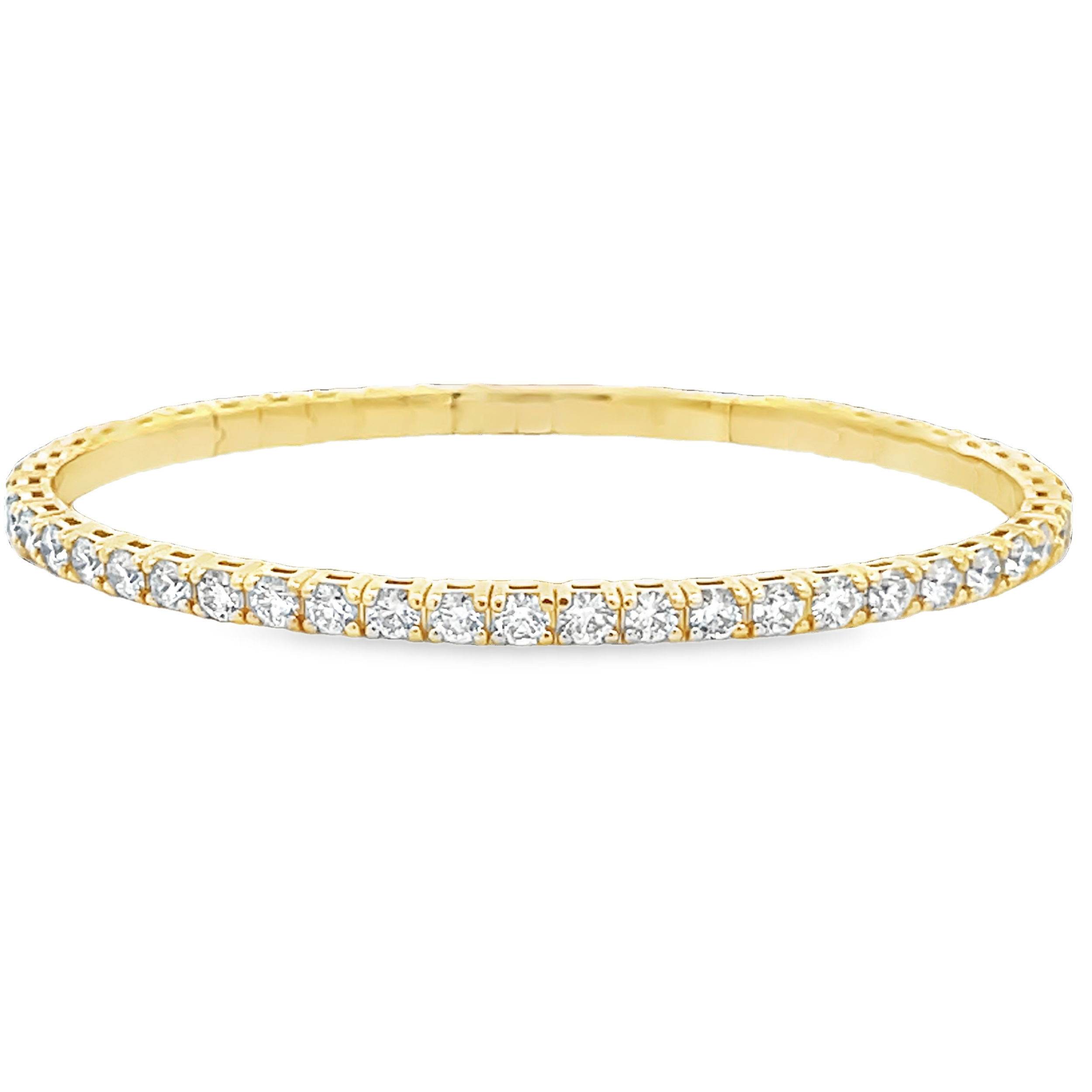 Allowing for further creativity in your collection, the flex technology that has been designed into this bracelet gives you more versatility within your style.-14k Yellow gold-Round diamonds, 5.00cts-Size 6.75Item# 808-00911 Diamond Flex Bangle