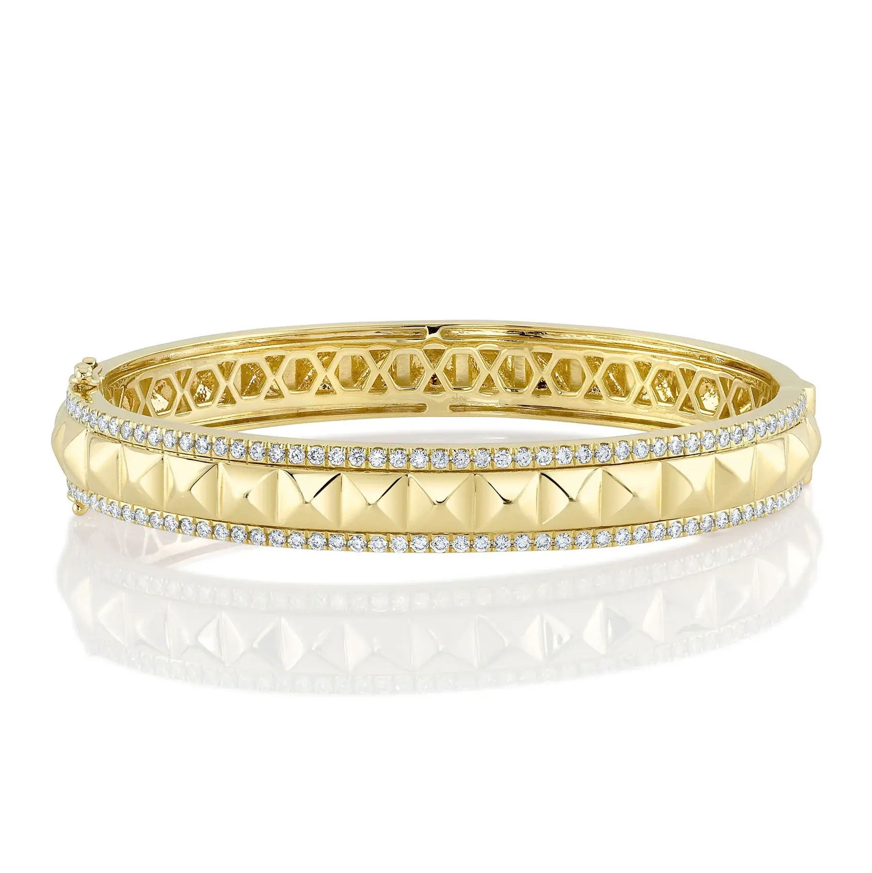 Make a bold statement with this eye-catching piece, designed to spark conversations. All Shy Creation diamonds are natural and hand-selected. All stones are unique and hand set. As a result, you can expect slight variations in the shade, hue, tint of the color stones and stone count.-14k Yellow gold-Round diamonds, 1.21cts-Size SItem# 808-00969 Diamond Pyramid Bangle