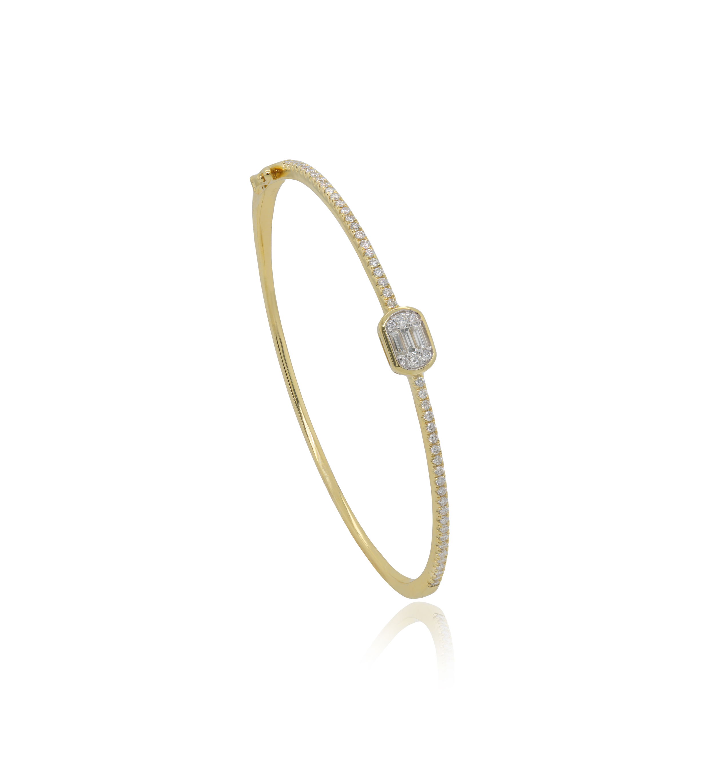This elegant diamond bangle features a striking rectangular cluster of baguette and round diamonds forming a radiant focal point, beautifully framed in a soft, rounded bezel. The clean lines and refined sparkle make this bangle a sophisticated choice—perfect for adding a touch of modern glamour to your everyday look or stacking with other favorites for added impact.-14k Yellow gold-Round and Baguette diamonds, 1.15ctsItem# 808-2000084 Cluster Bangle