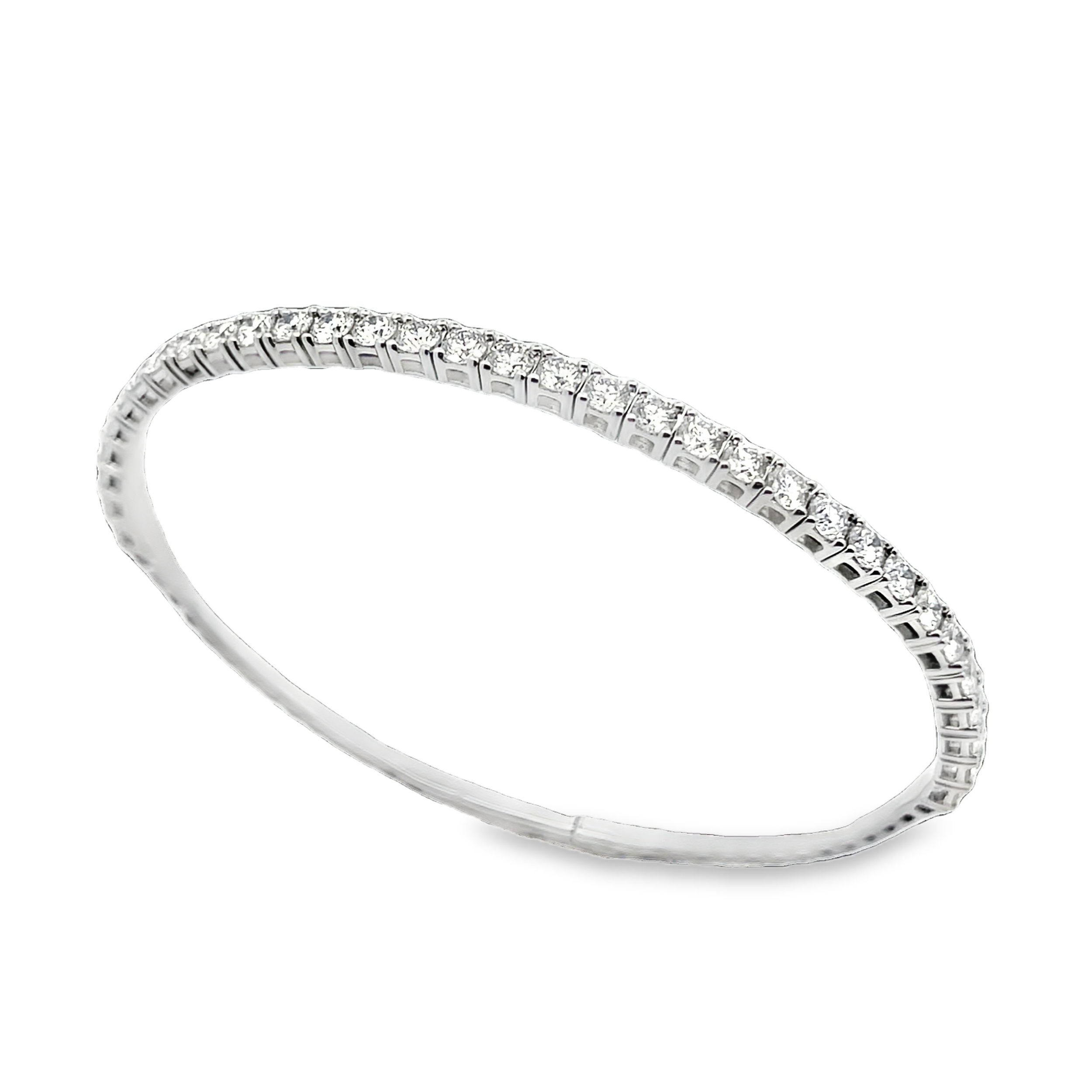 Allowing for further creativity in your collection, the flex technology that has been designed into this bracelet gives you more versatility within your style.-14k Yellow gold-Round diamonds, 2.99cts-Size, 6.75Item# 808-2000105 Diamond Flex Bracelet