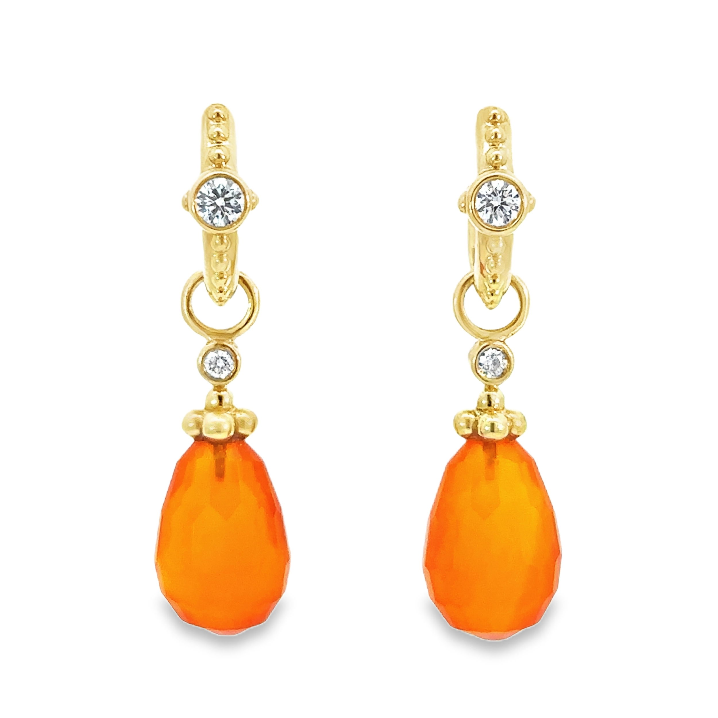 These 18k yellow gold earring charms with round diamonds offer a subtle touch of sparkle. Perfect for everyday wear or a special occasion. Huggies sold separately.-18k Yellow gold-Carnelion charms-Round diamonds, 0.03ctsItem# 809-00647 Carnelian Earring Charms