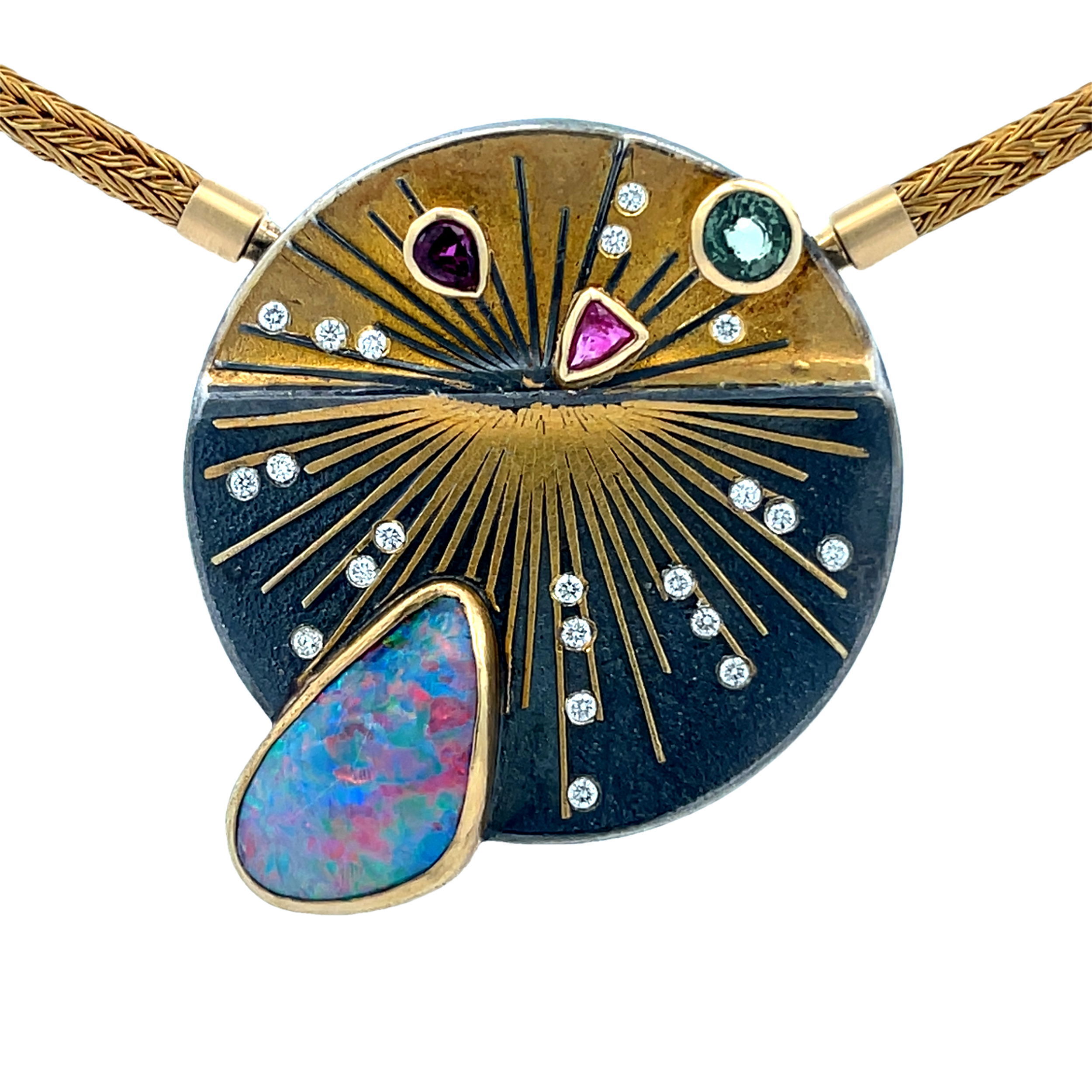 With inspiration rooted in natural structures and growth patterns, Peter Schmid finds his muse within nature and urban environments themselves. Showcasing a unique approach to jewelry design, the world of Atelier Zobel boasts creativity and inspiration within every piece.-24k Yellow gold-Sterling silver-Oval opal, 5.22ct-Rose sapphire, 0.59ct-Ruby, 0.35ct-Round diamonds, 0.18ctsItem# 811-00238 Opal Burst Pendant