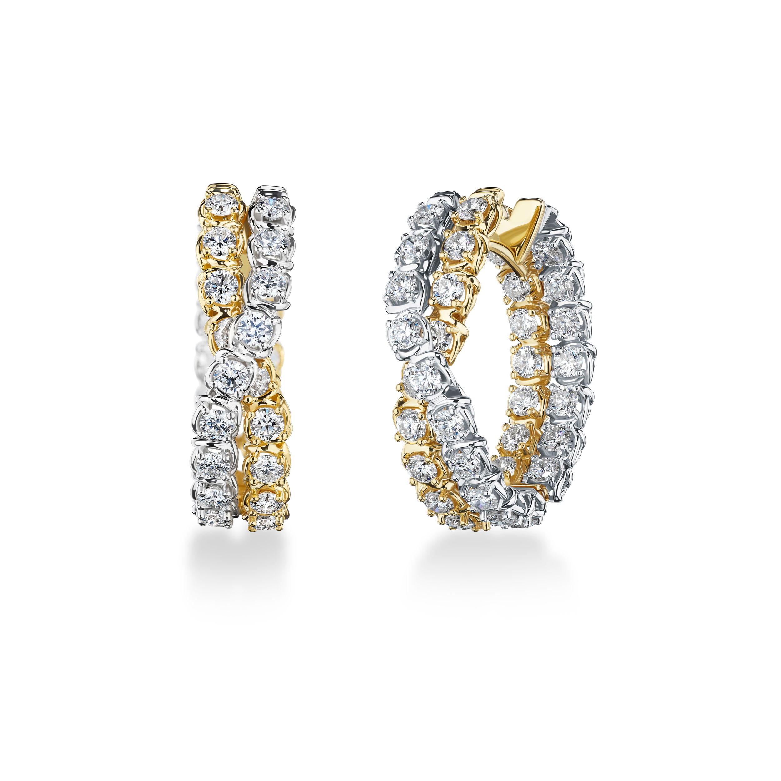 These two-tone crossover hoop earrings blend classic elegance with modern design. The intertwined gold and diamonds create a dynamic, layered look that adds depth and sophistication. -18k Two toned gold-Round diamonds, 3.66ctsItem# 150-01885 Cross Over Earrings