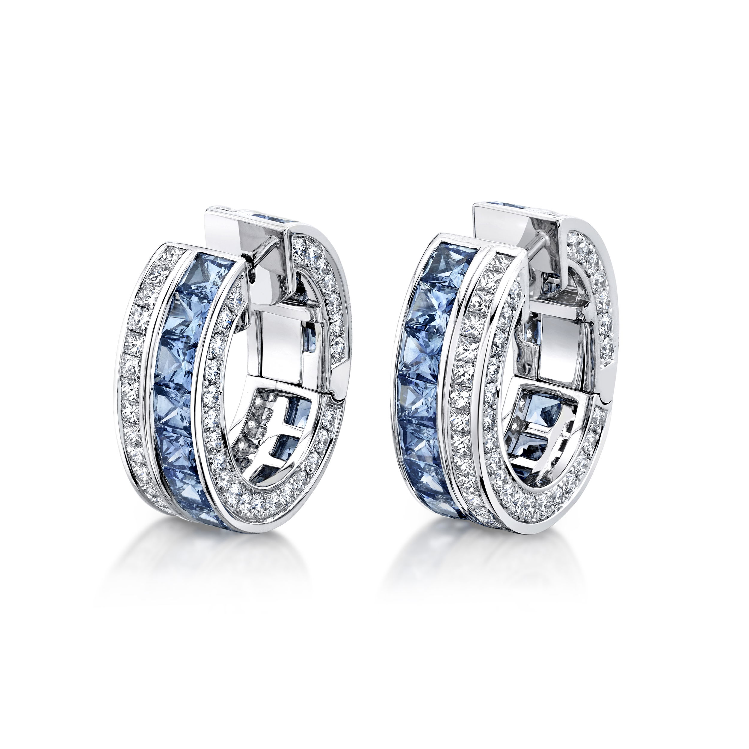 These earrings blend platinum and 18k white gold, featuring a stunning combination of sapphires and diamonds. Elegant and versatile, they add a refined sparkle and rich color to any occasion.-Platinum-18k White gold-Sapphires, 7.20cts-Round diamonds, 3.98ctsItem# 001-150-01901 French Masterpiece Earrings