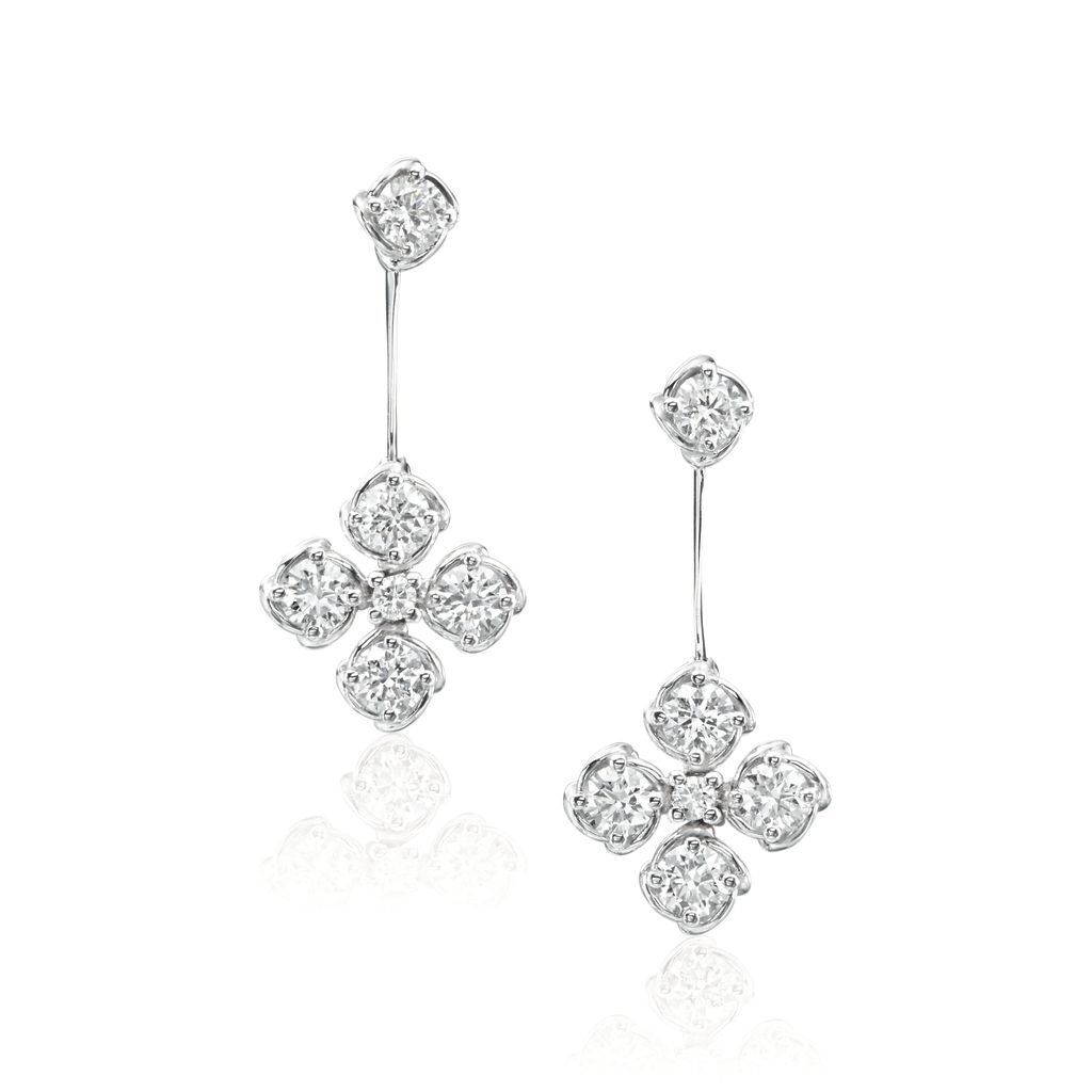 Delicate and feminine, these drop earrings showcase a stunning floral design adorned with shimmering diamonds. Each petal is crafted to capture light beautifully, creating a graceful sparkle with every movement. -18k White gold-Round diamonds, 1.50ctsItem #: 150-01909 Flower Drop Earrings