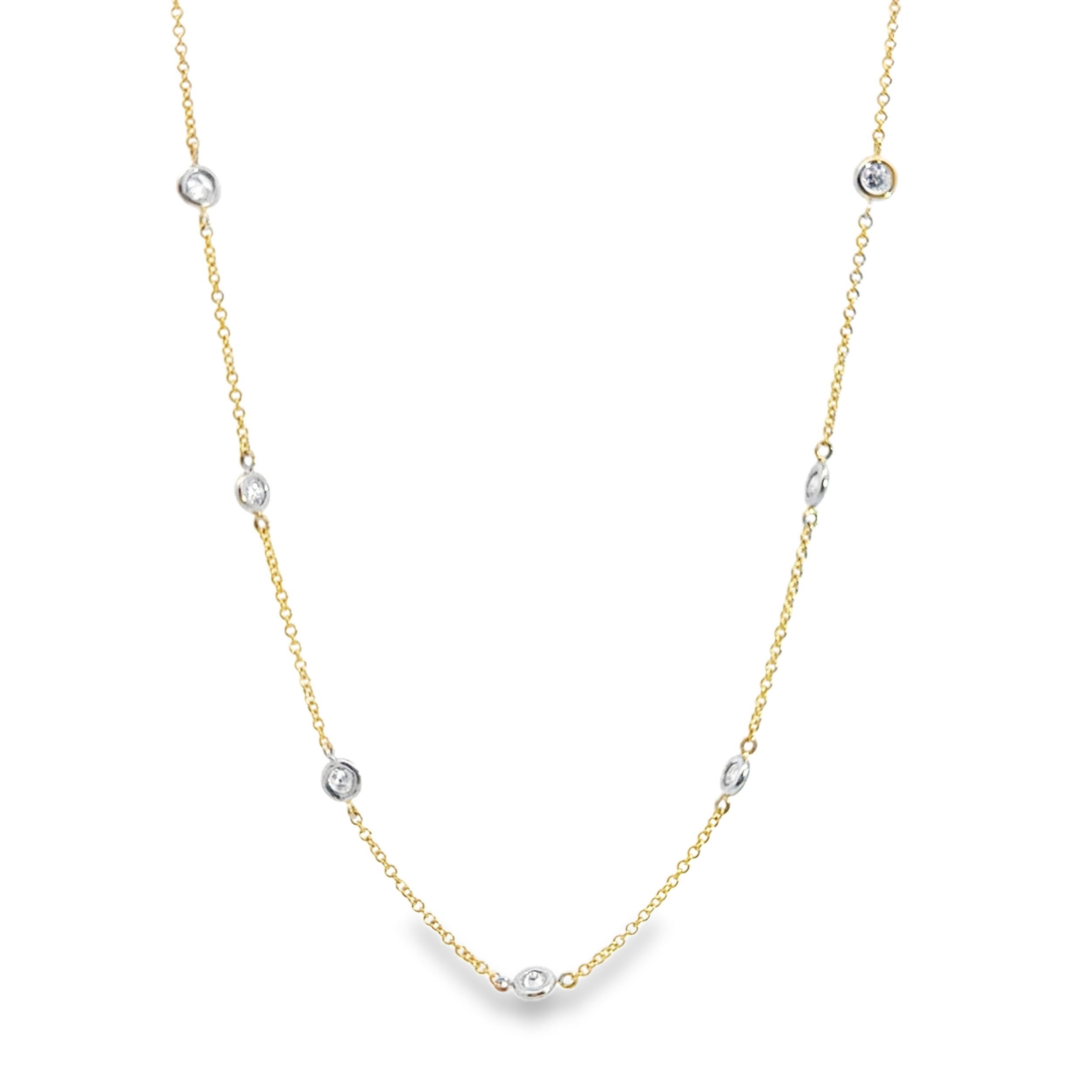 This two-toned necklace blends 14k white gold and 18k yellow gold for a modern yet timeless contrast. Accented with diamonds, it's a versatile piece that moves effortlessly from day to night.-18k Yellow gold-14k White gold-Diamonds, 1.29ctsItem# 001-165-00878 Diamonds by the Yard Necklace