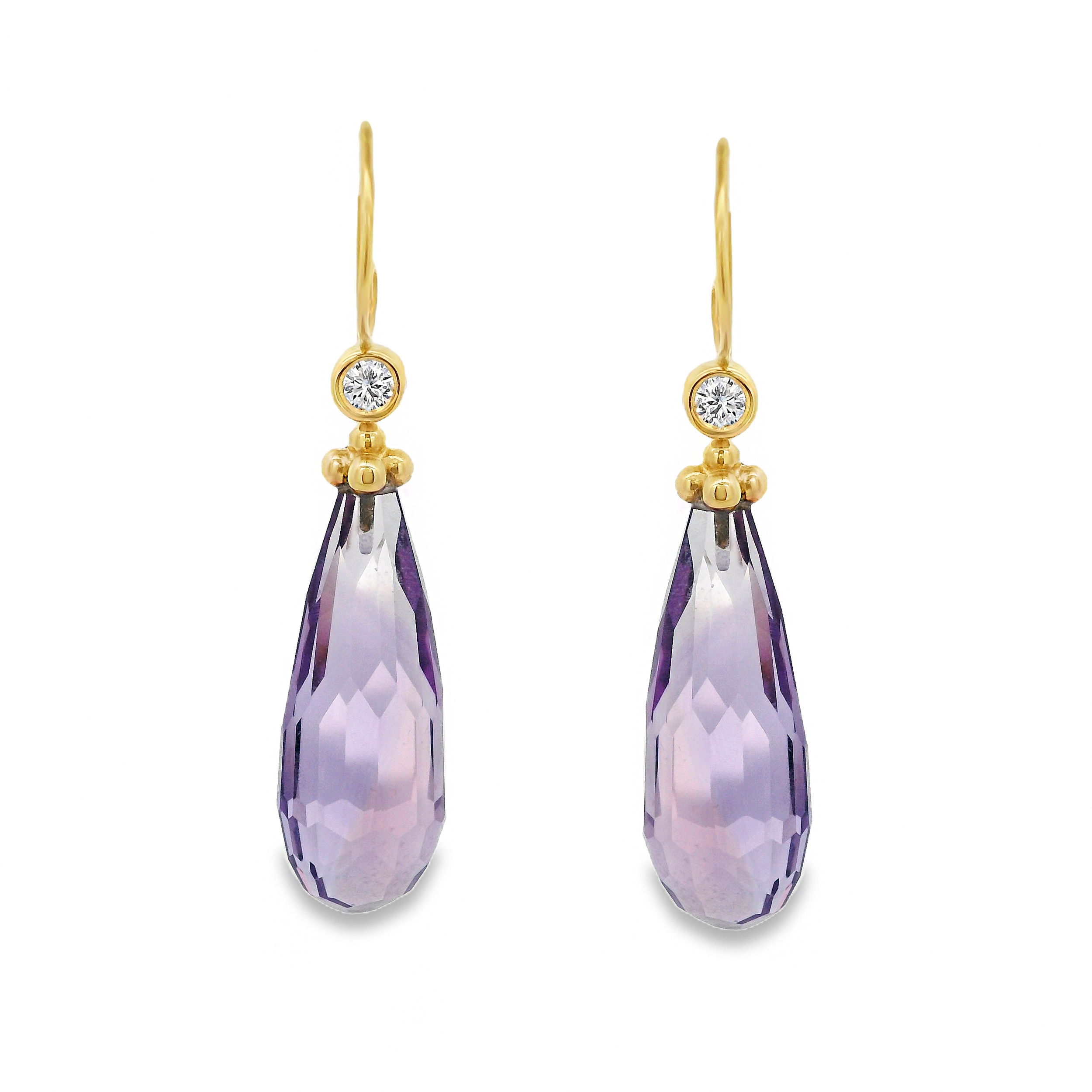 These 18k yellow gold earrings feature faceted amethyst briolettes that catch the light with every movement. Delicate yet vibrant, they add a playful touch of color to any outfit.-18k Yellow gold-Amethyst briollettesItem# ND-EAR-00004 Amethyst Briolette Earrings
