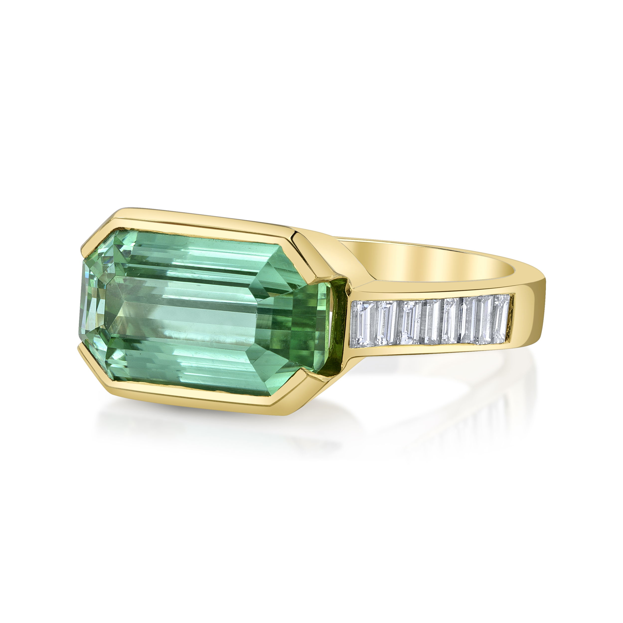Crafted in 18k yellow gold, this ring showcases a vivid green tourmaline accented by shimmering diamonds. A fresh take on classic elegance, it adds a pop of color to any look. Cheers, Valerie!-18k Yellow gold-Green tourmaline-Diamonds, 0.53ctsItem# ND-Ring-00002 Cheers Ring