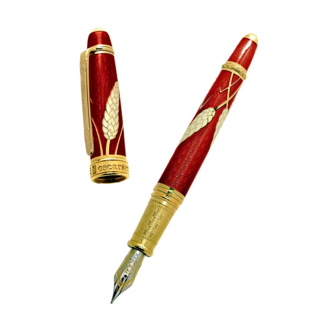 The Harvest Pen by David Oscarson is a limited-edition writing instrument, adorned with luxurious Yellow Gold Vermeil and intricate details. With an 18k yellow gold nib, this pen offers a smooth writing experience, making it both a functional tool and a work of art. Limited to just 88 pieces, the Harvest Pen is a testament to sophistication and craftsmanship, perfect for signing important documents or adding to a prestigious collection. This pen elevates your writing experience with its blend of artistry and elegance.-18k Yellow Gold Vermeil-Enamel Harvest Pen 52/88