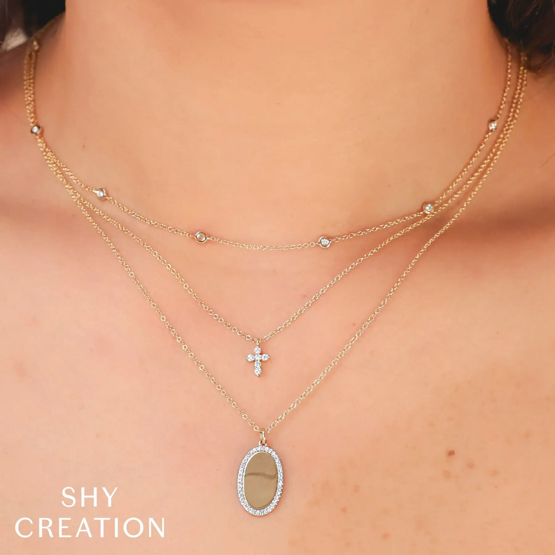 A timeless piece that elevates both casual and formal outfits, perfect for any occasion. All Shy Creation diamonds are natural and hand-selected. All stones are unique and hand set. As a result, you can expect slight variations in the shade, hue, tint of the color stones and stone count.-14k White gold-Round diamonds, 0.10cts-Chain length, 15"-18" on adjustable chainItem# 807-2000139 Diamond Cross Necklace