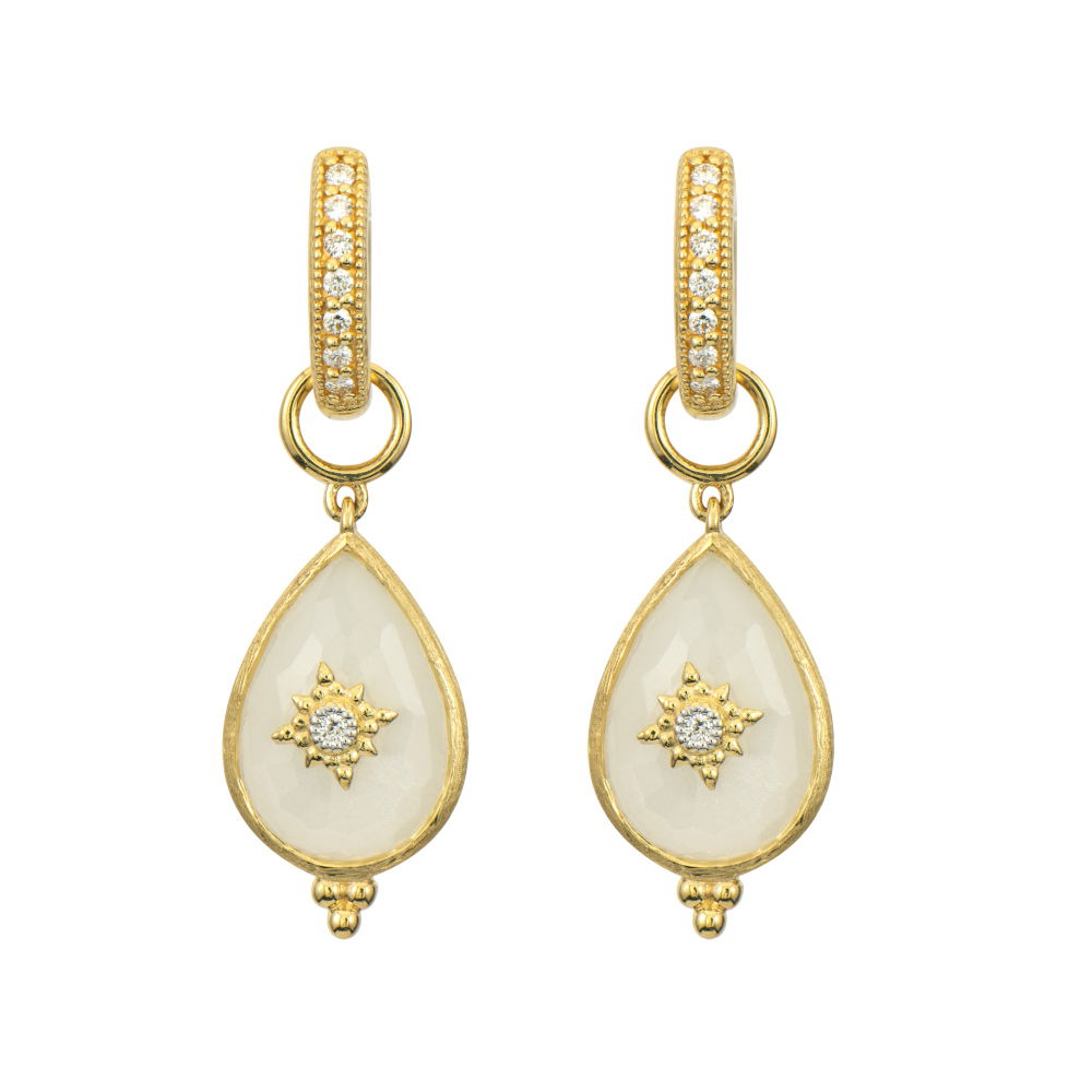 Combining classic elegance with on trend shapes and styles, JFJ offers something for women of all ages. From the Provence Collection, these moonstone earring charms are accented with diamonds, radiating understated elegance. A perfect blend of sophistication and modern style, it effortlessly elevates any ensemble. Hoop and charms sold separately.-18k Yellow gold-Moonstones-Round white diamonds, 0.01ctsItem# 809-2000051 Moonstone and Diamond Charms