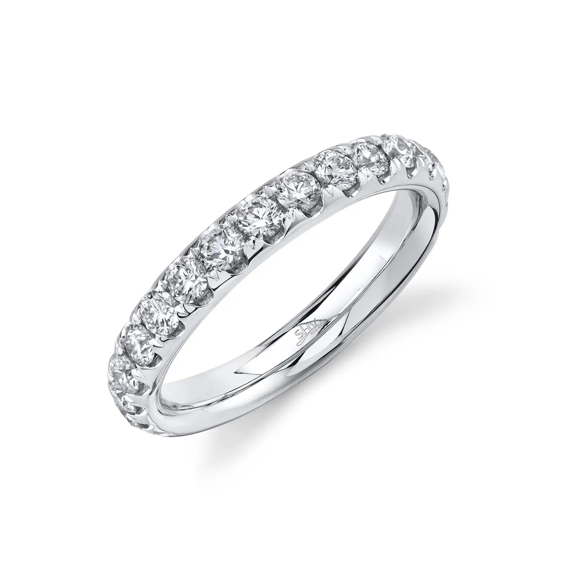 Seamlessly blend this elegant piece with your favorite pieces for a look that is both refined and effortless. All Shy Creation diamonds are natural and hand-selected. All stones are unique and hand set. As a result, you can expect slight variations in the shade, hue, tint of the color stones and stone count.-14k White gold-Round diamonds, 0.94cts-Size 7Item# 804-2000105 Diamond Eternity Band