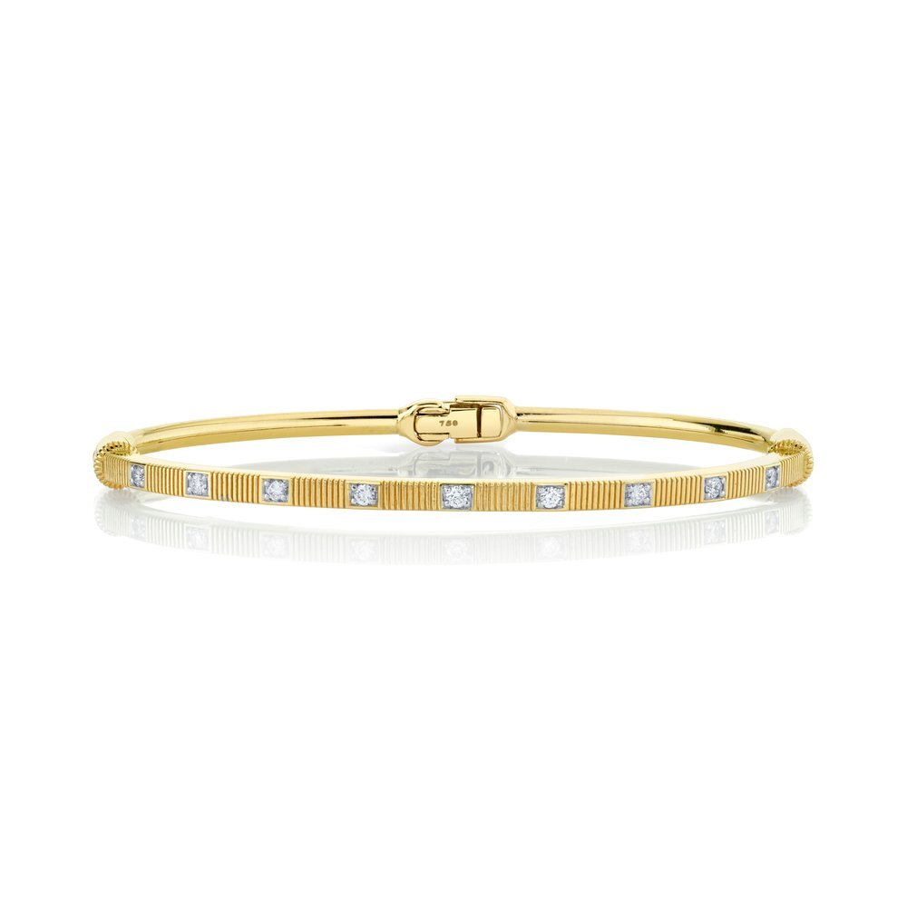Designed and crafted in Southern California, the refined design of this piece makes it a perfect addition to any jewelry box, offering style that can be enjoyed for years to come.-18k Yellow gold-Round white diamonds, 0.29cts-Size 6.5Item# 808-2000113 Diamond & Strie Bracelet