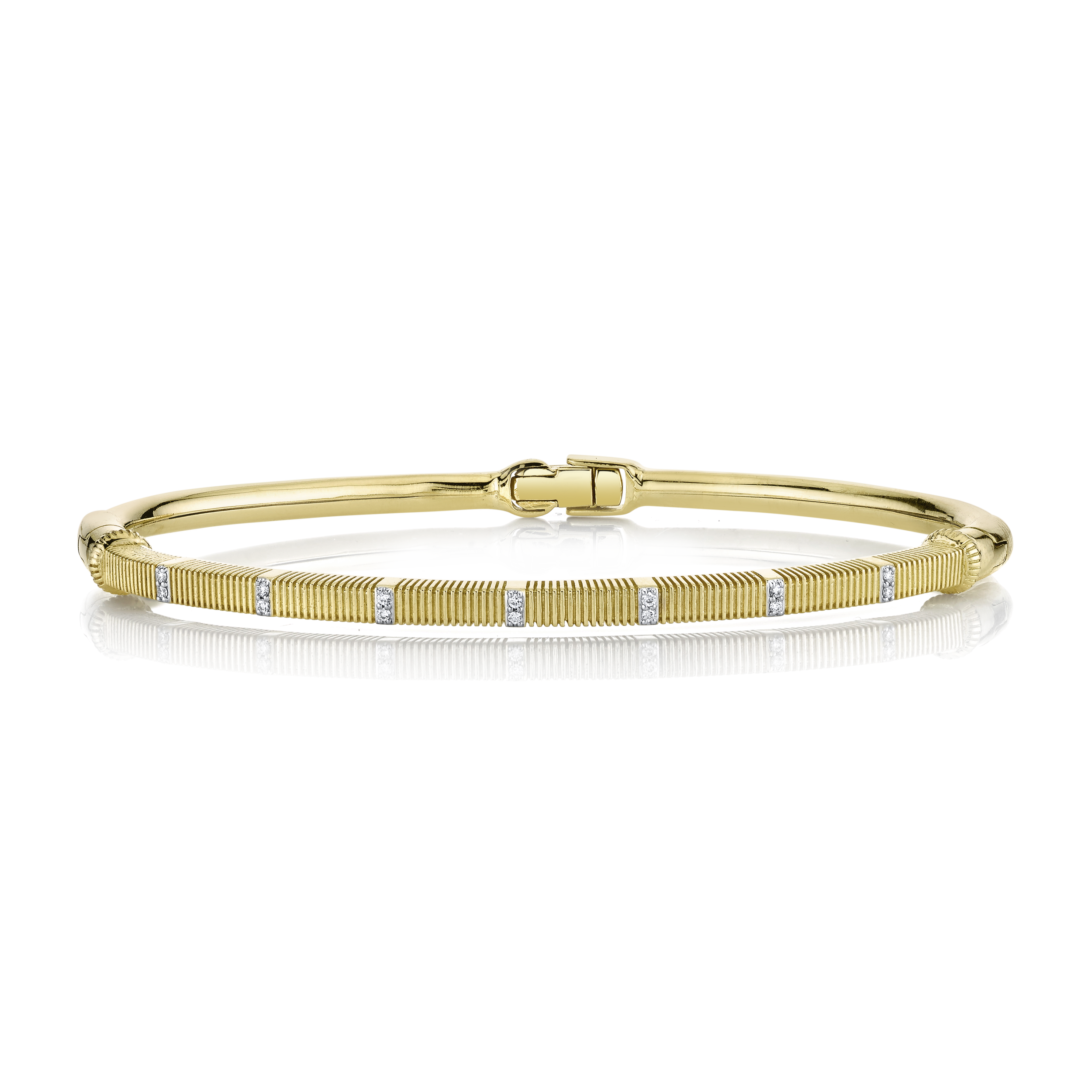Lovingly made in Southern California, sometimes, less is more. This piece celebrates simplicity with a design that is clean, refined, and effortlessly beautiful.-18k Yellow gold-Round white diamonds, 0.07cts-Size 6.5Item# 808-2000114 Strie Bracelet with White Diamond Detail