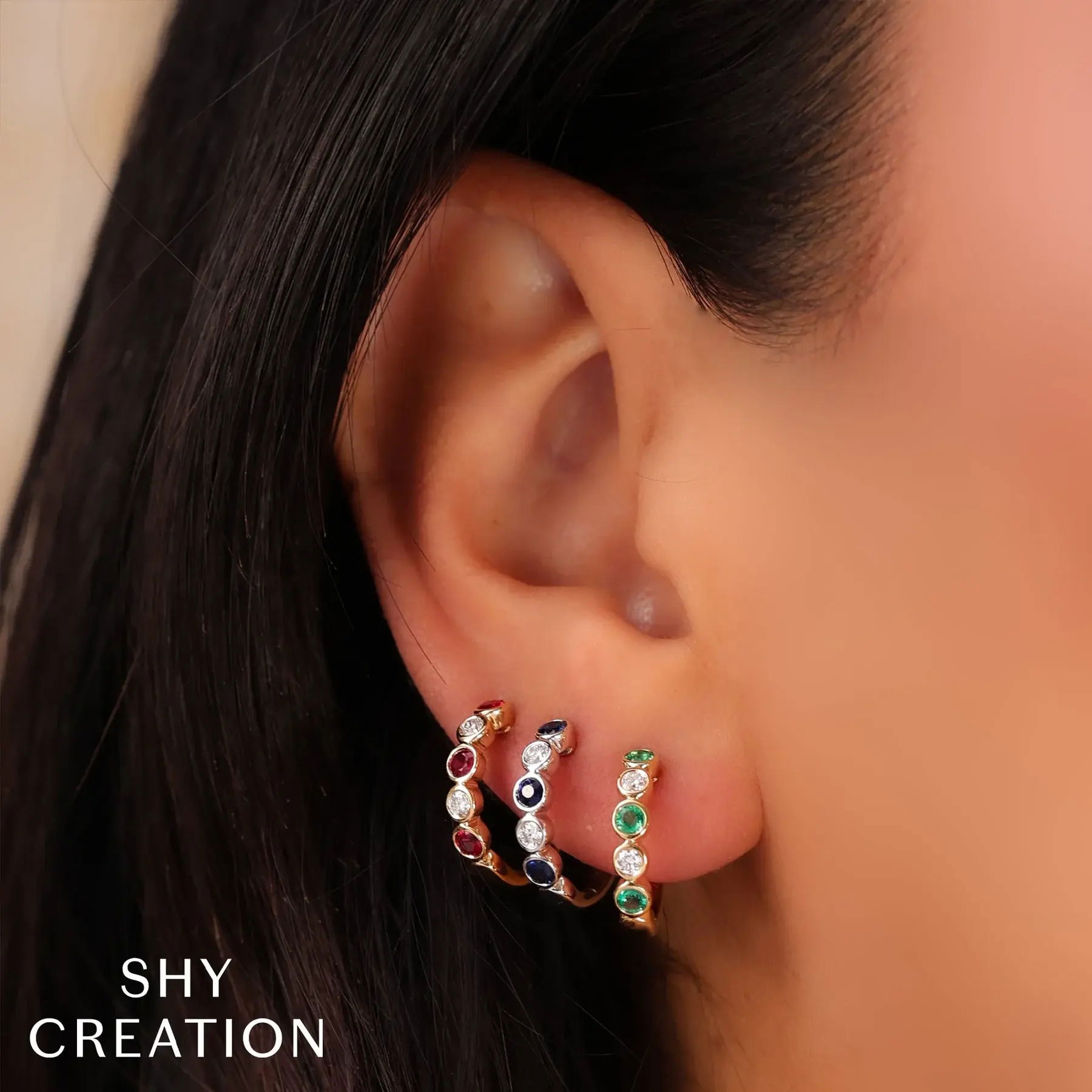 Diamond and Emerald Bezel Huggie Earrings