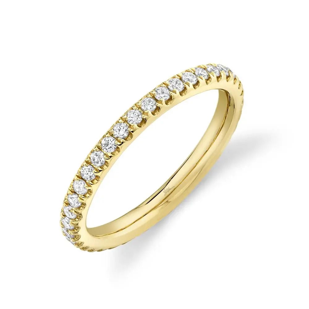 An elegant piece designed for everyday wear, offering both beauty and comfort in one timeless design. All Shy Creation diamonds are natural and hand-selected. All stones are unique and hand set. As a result, you can expect slight variations in the shade, hue, tint of the color stones and stone count.-14k Yellow gold-Round diamonds, 0.58cts-Size 7Item #804-2000115 Diamond Eternity Band