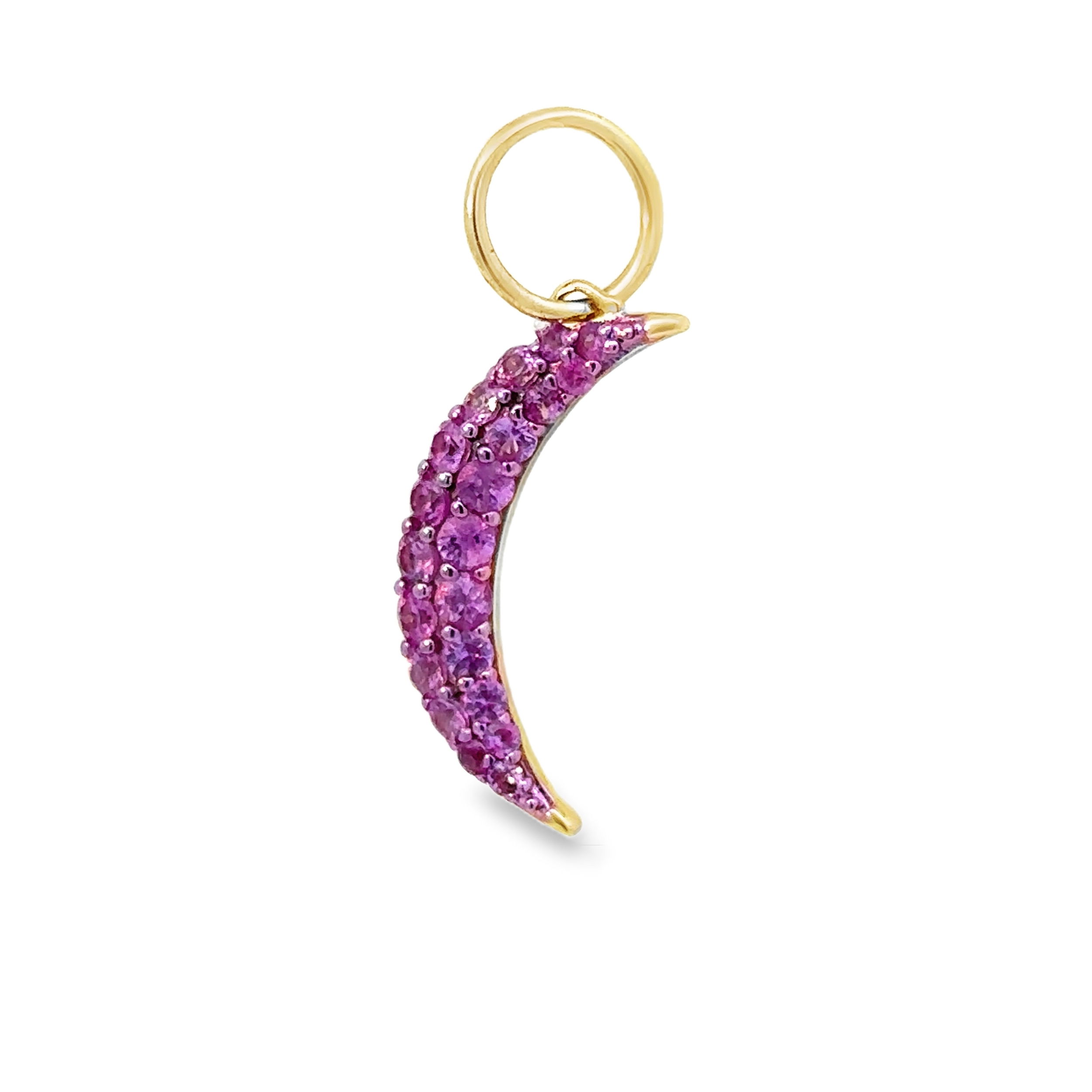 This pendant features delicate pink sapphires, accentuating the graceful curve of the moon. The soft, vibrant hue of the sapphires adds a touch of warmth and elegance, making it a stunning and unique addition to any collection.-14k Yellow gold-Round pink sapphires, 0.66ctsItem# 806-2000066 Pink Sapphire Crescent Moon Pendant