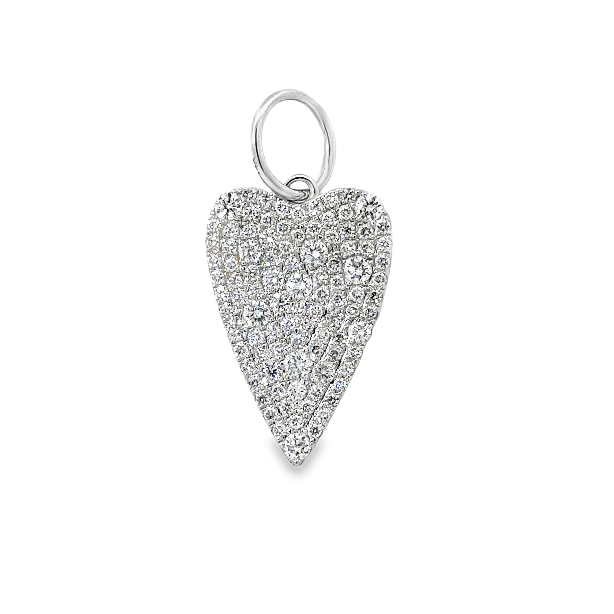 This pendant is encrusted with sparkling diamonds, creating a dazzling and romantic design. Its timeless shape and radiant details make it a perfect symbol of love and elegance, adding sophistication to any look.-14k White gold-Round white diamonds, 0.72ctsItem# 806-2000071 Pave Heart Pendant