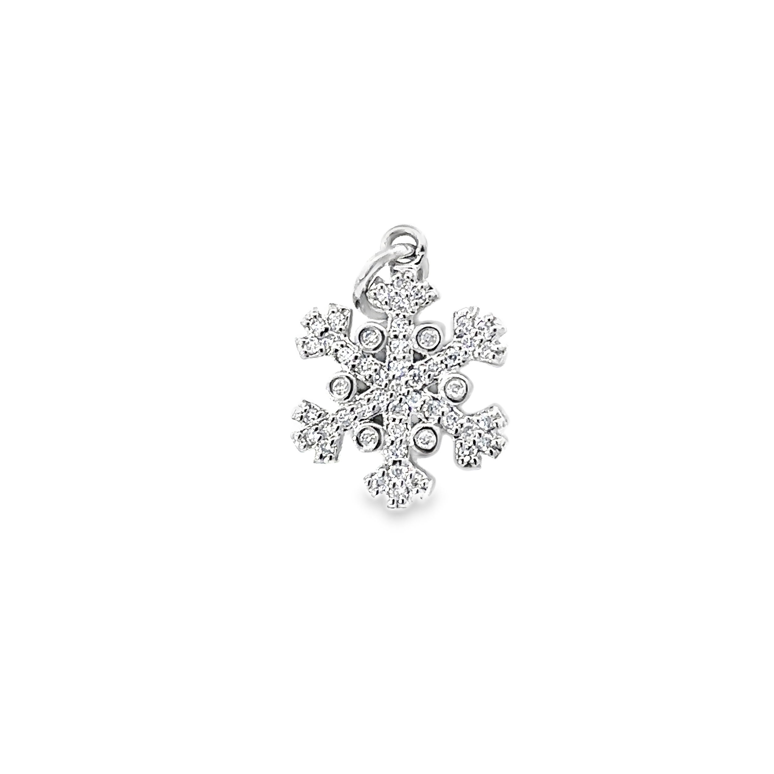 This pendant features a stunning snowflake design, with sparkling diamonds set in a white gold frame. The intricate details and brilliant diamonds capture the essence of winter, adding elegance and a touch of luxury to any collection.-14k White gold-Round white diamonds, 0.22ctsItem# 806-2000075 White Gold & Diamond Snowflake Pendant