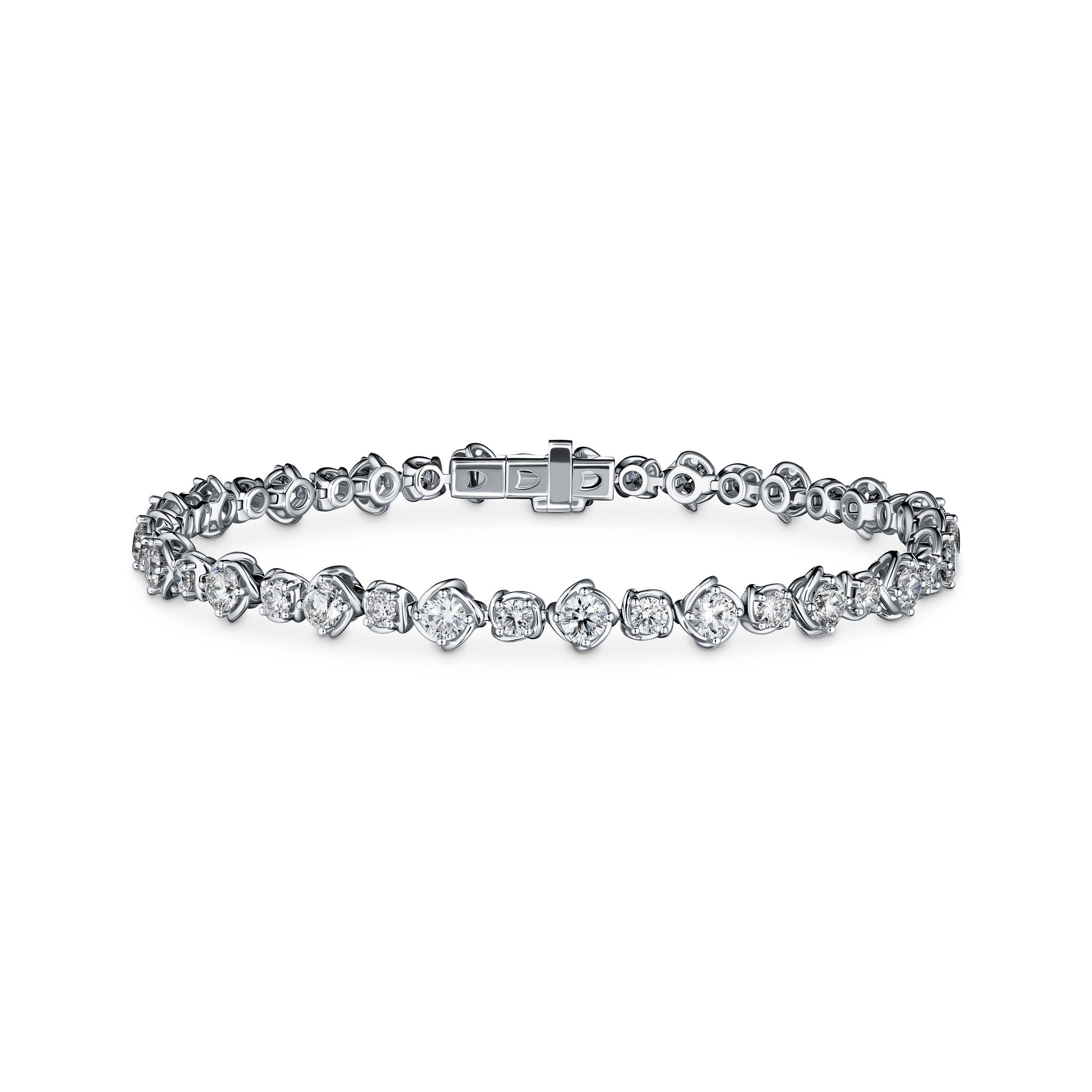 A modern take on a classic favorite, this diamond tennis bracelet features a unique twist bezel setting that beautifully enhances each diamond’s brilliance. Designed for both elegance and everyday wear, this piece offers timeless sparkle with a contemporary touch.-18k White gold-Round diamonds, 3.67cts-Length, 7"Item# 170-2000015 Bezel Tennis Bracelet